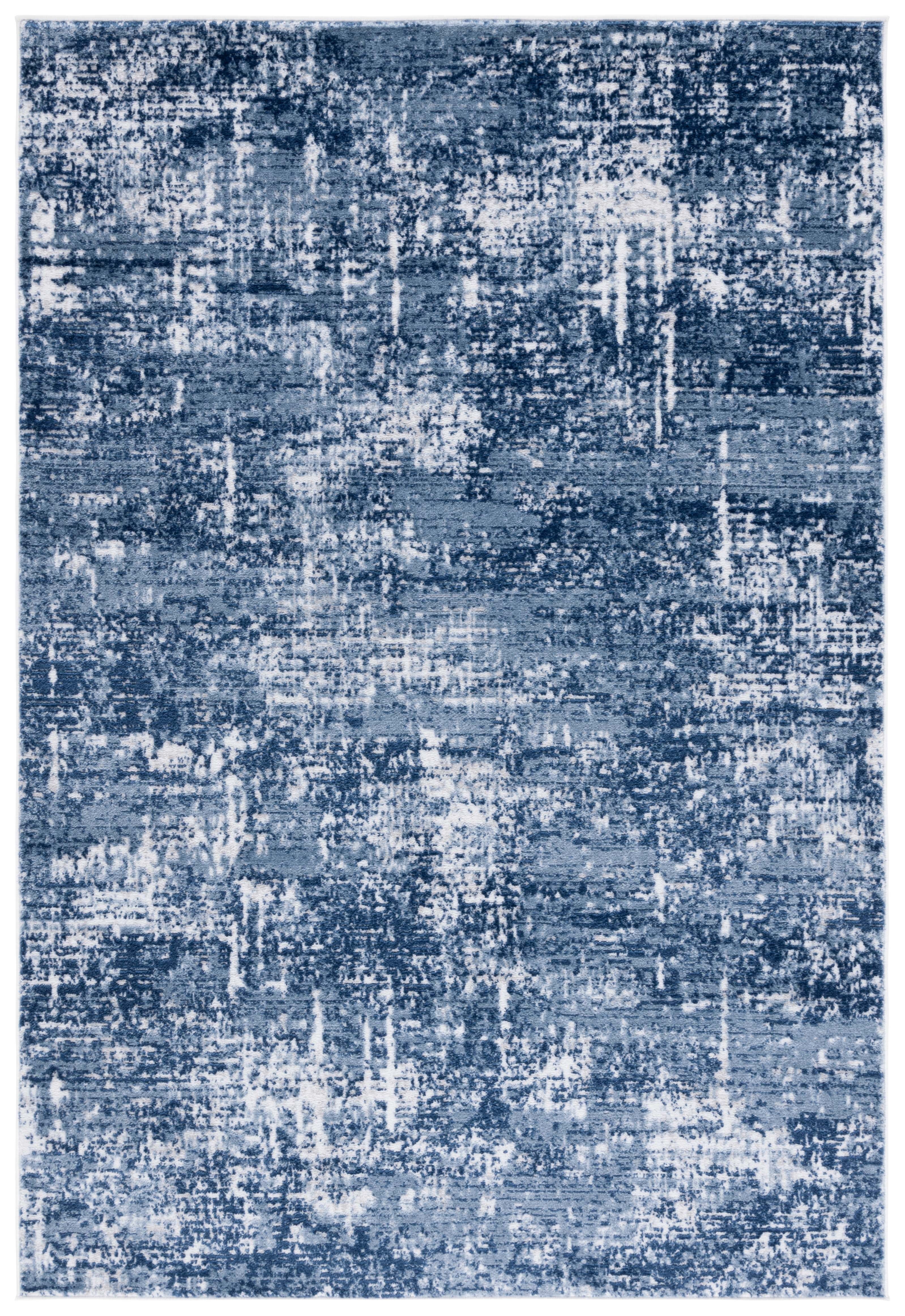 Ivory and Dark Blue Abstract Synthetic 10' x 14' Area Rug