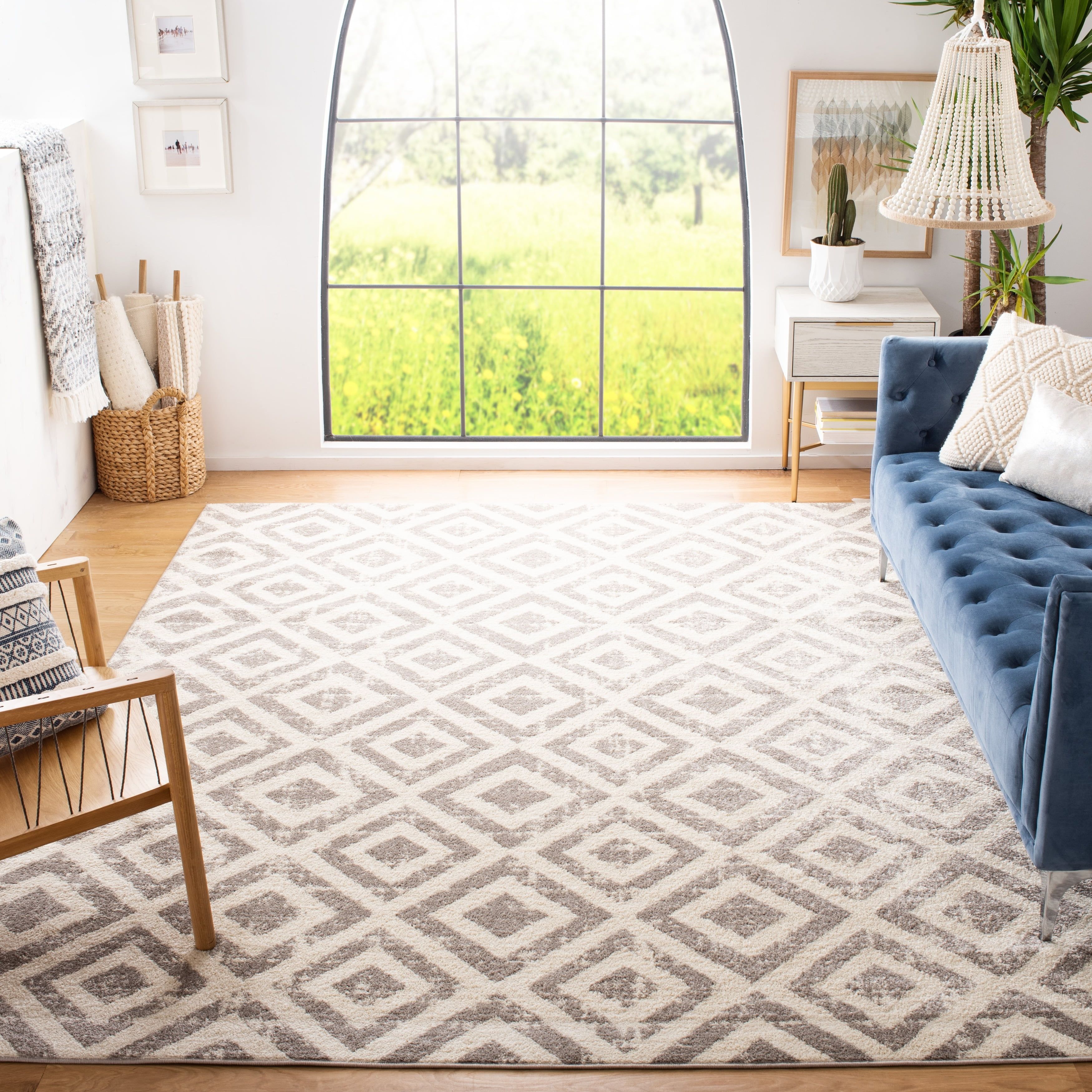 Ivory Geometric Easy-Care 10' x 14' Synthetic Area Rug