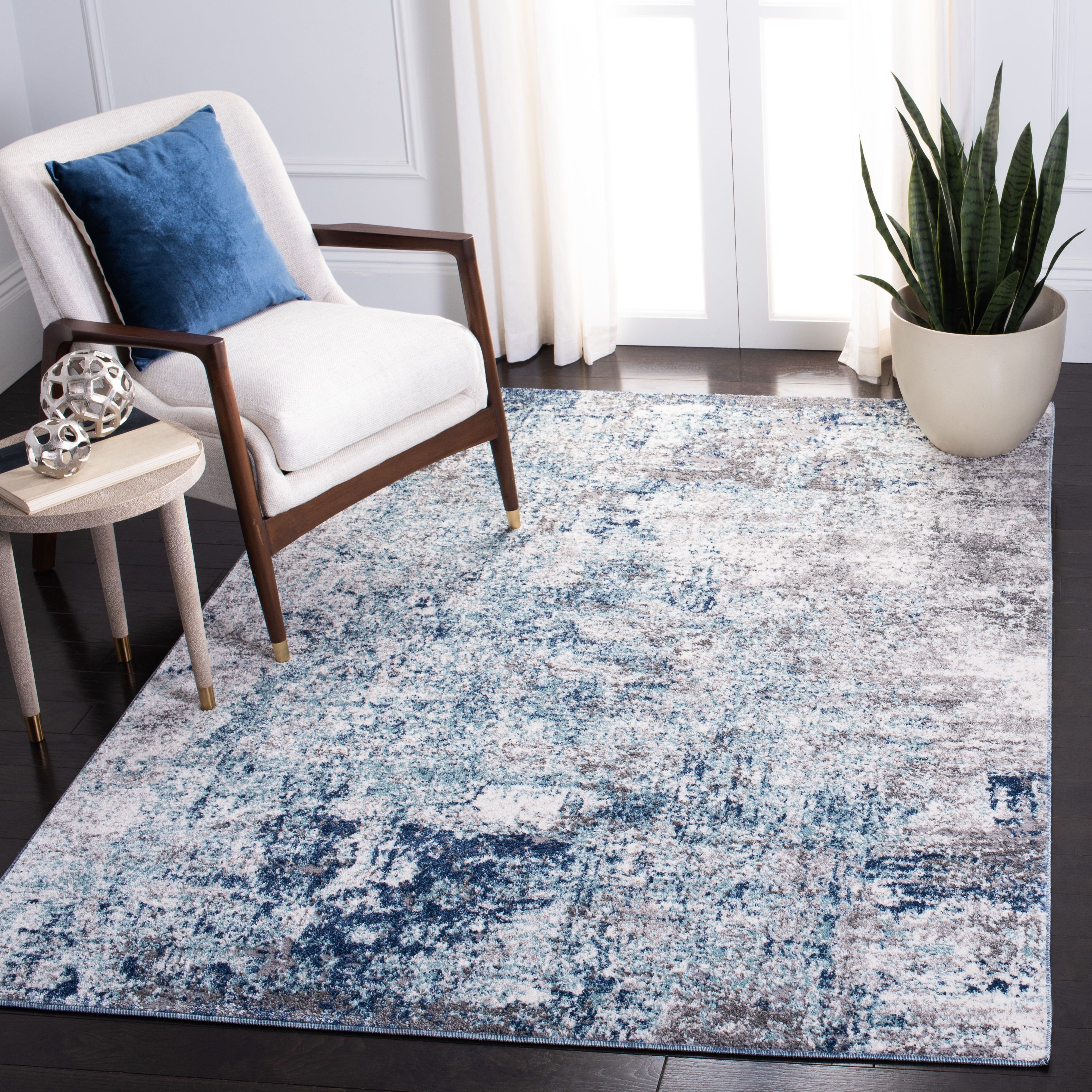 Gray and Light Blue Abstract 8' x 10' Synthetic Area Rug