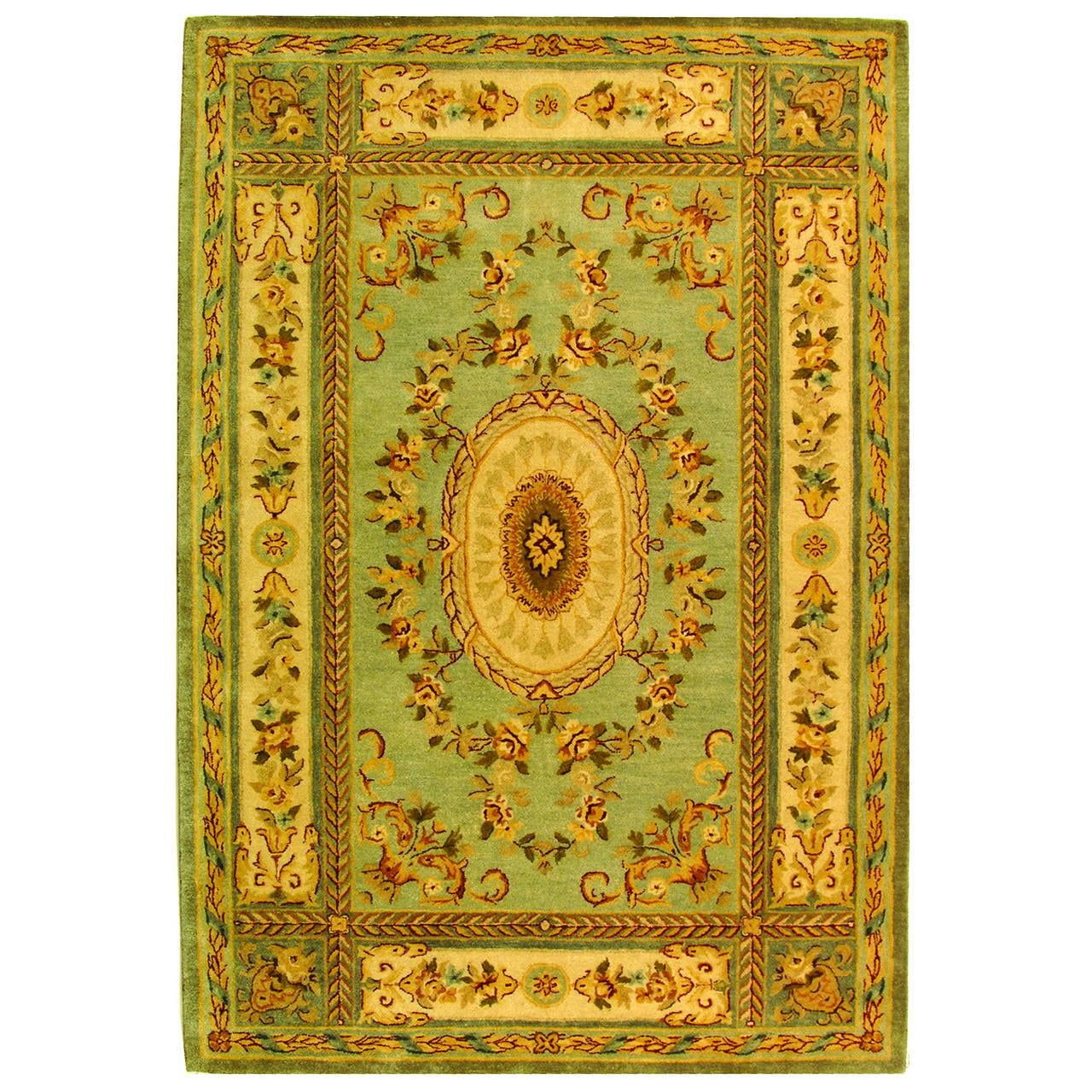 Light Blue Handmade Wool Tufted 6' x 9' Area Rug