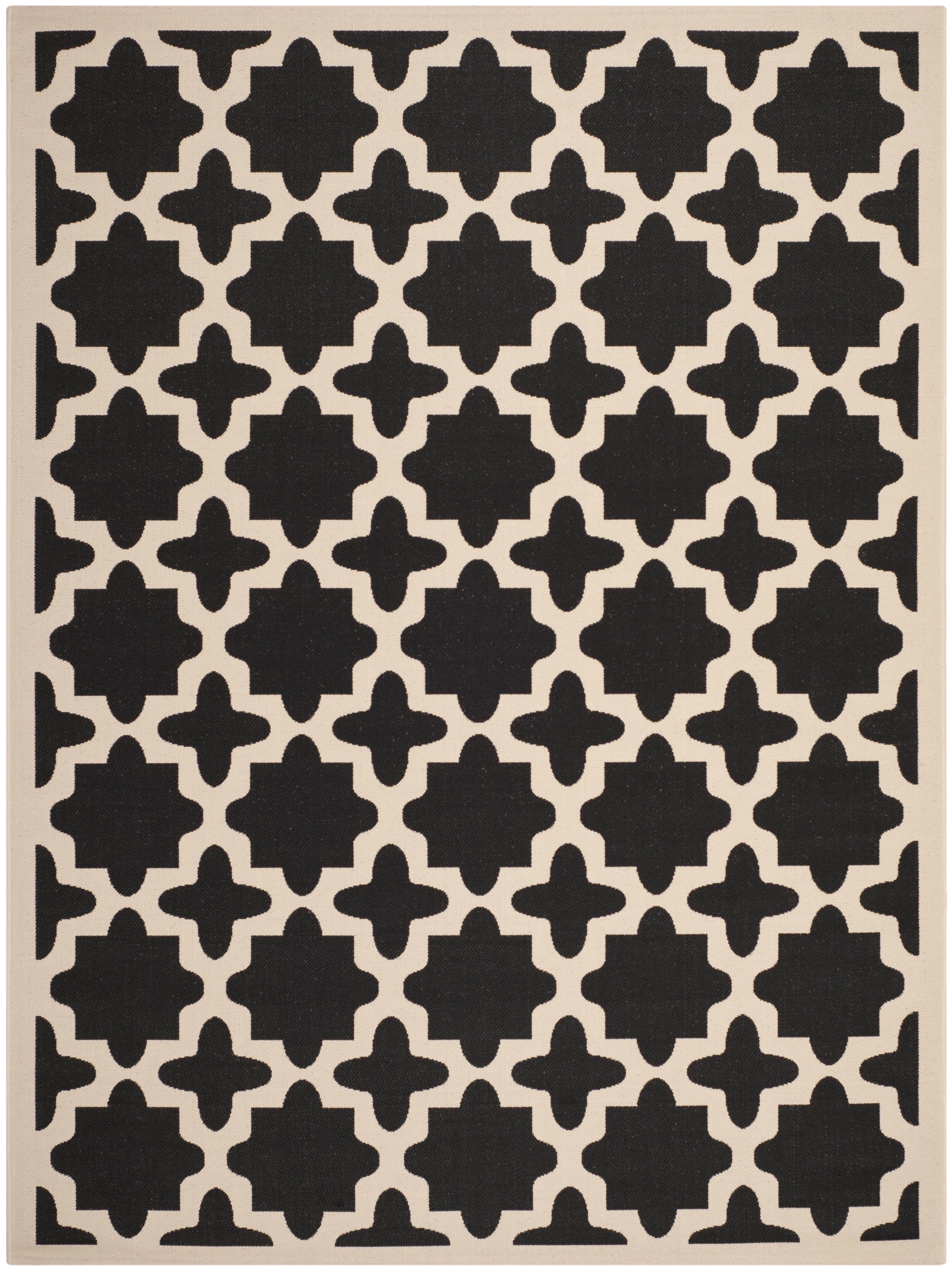 Reversible Black and Beige Synthetic 5' x 7' Indoor/Outdoor Rug