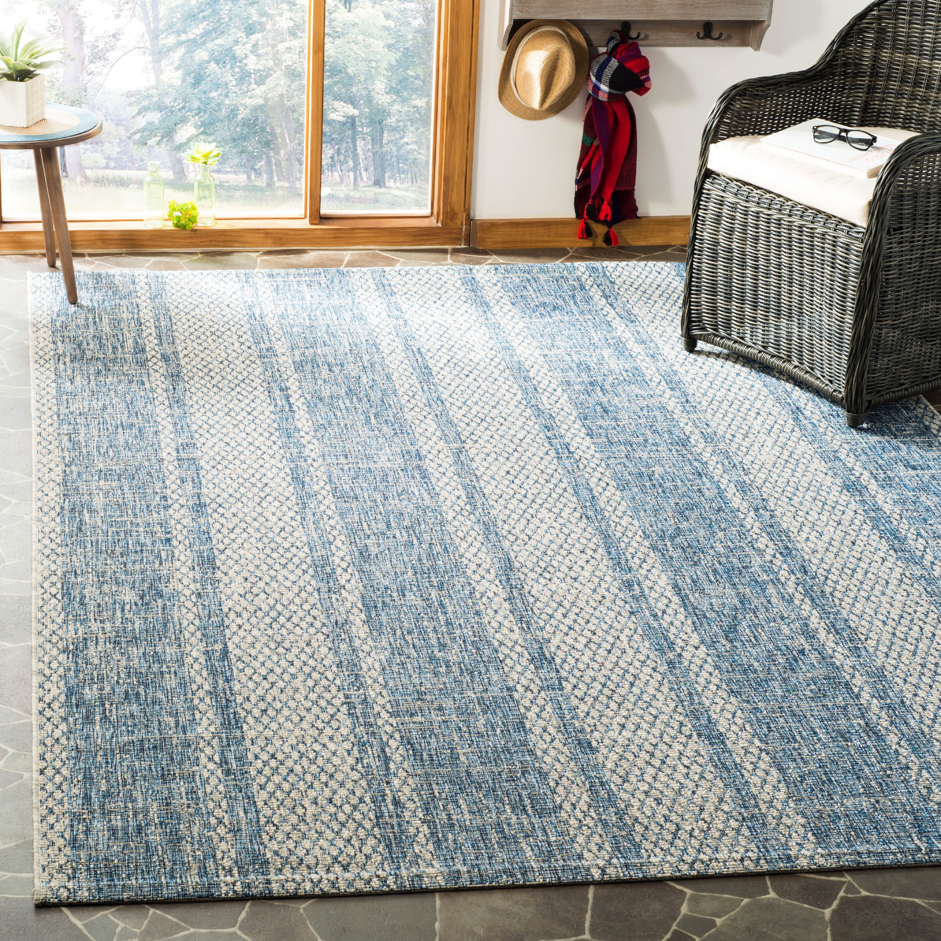 Light Grey and Blue Round Synthetic Outdoor Rug, 6' 7" x 9' 6"