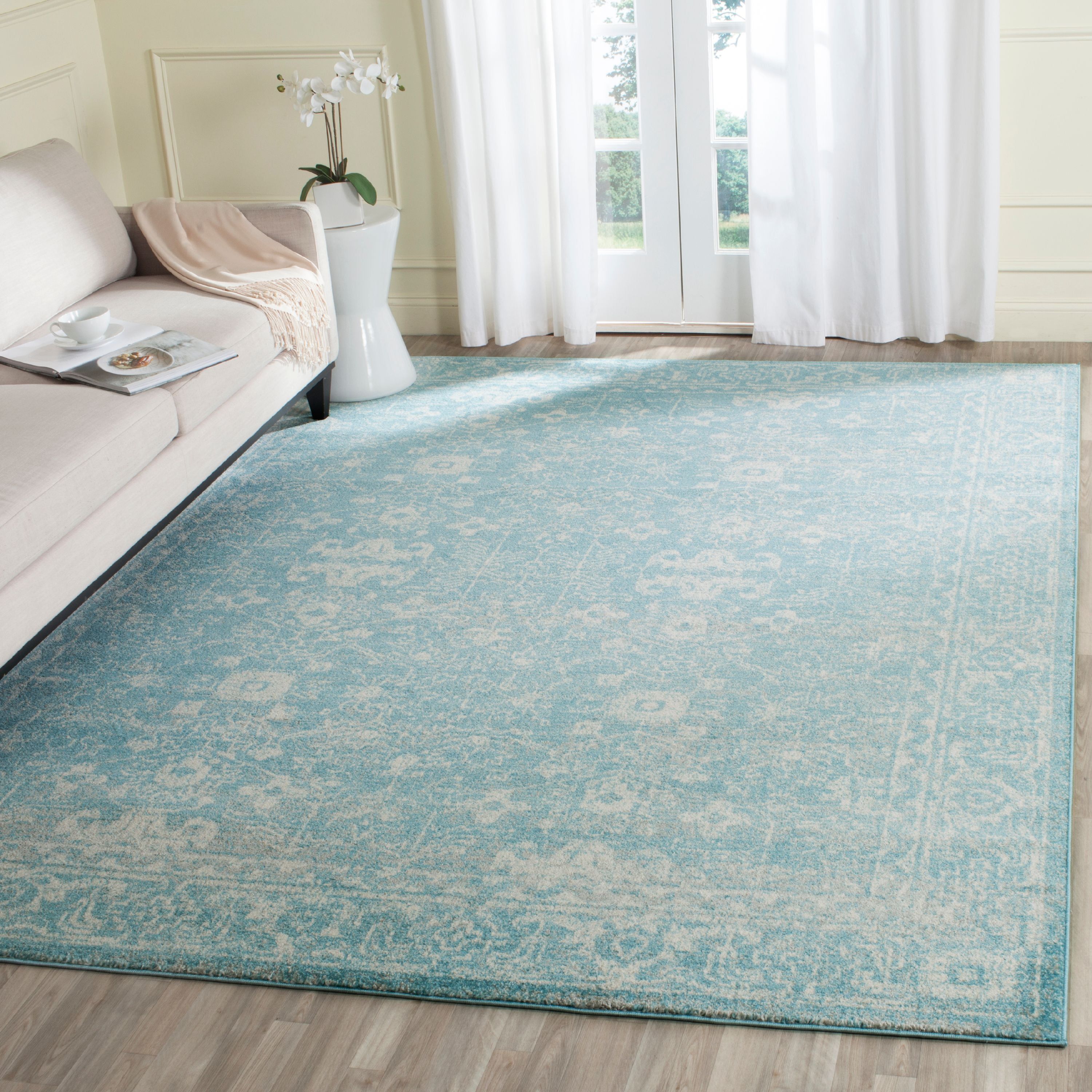 Ivory Elegance 9' x 12' Synthetic Rectangular Easy-Care Area Rug