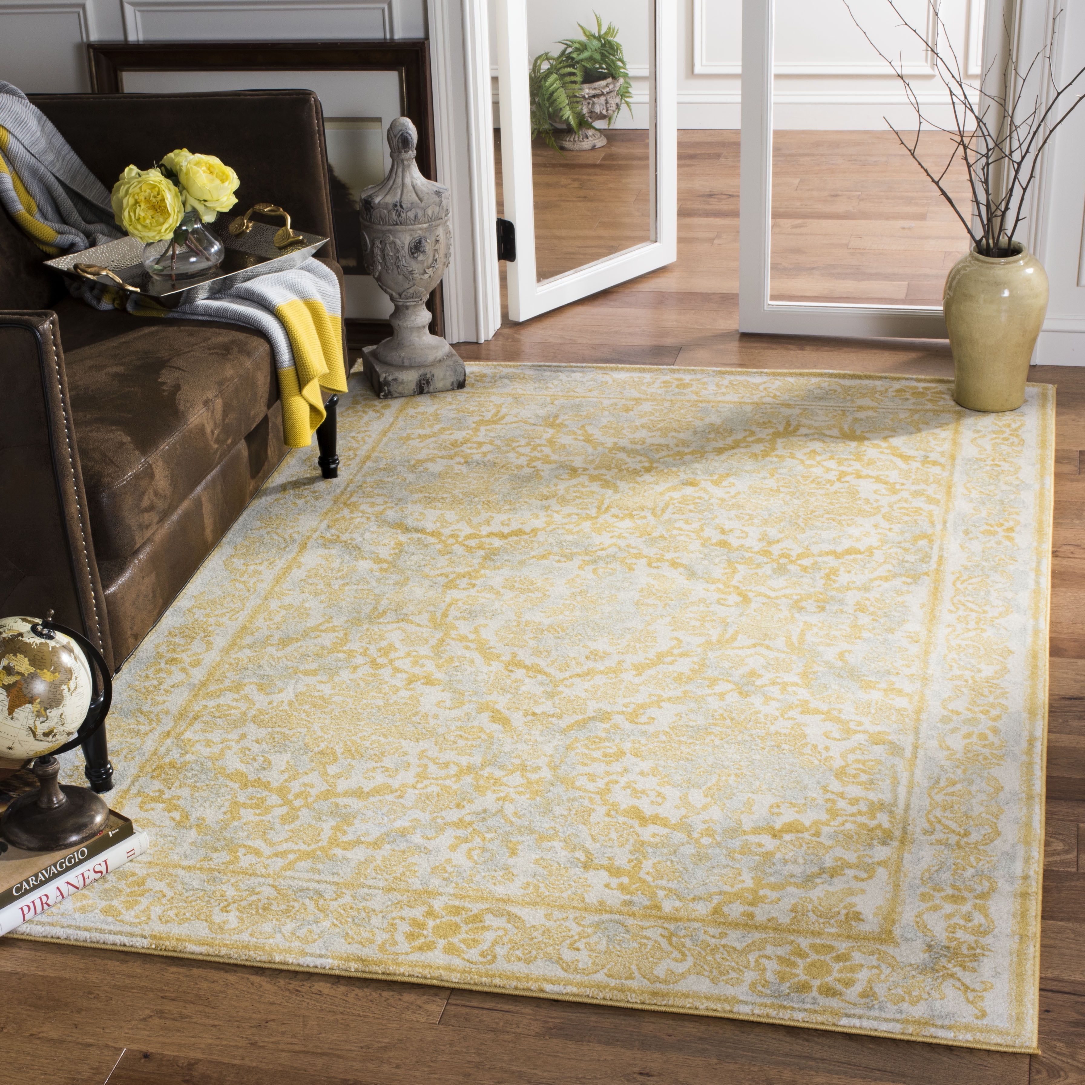 Ivory and Gold Synthetic 10' x 14' Reversible Area Rug