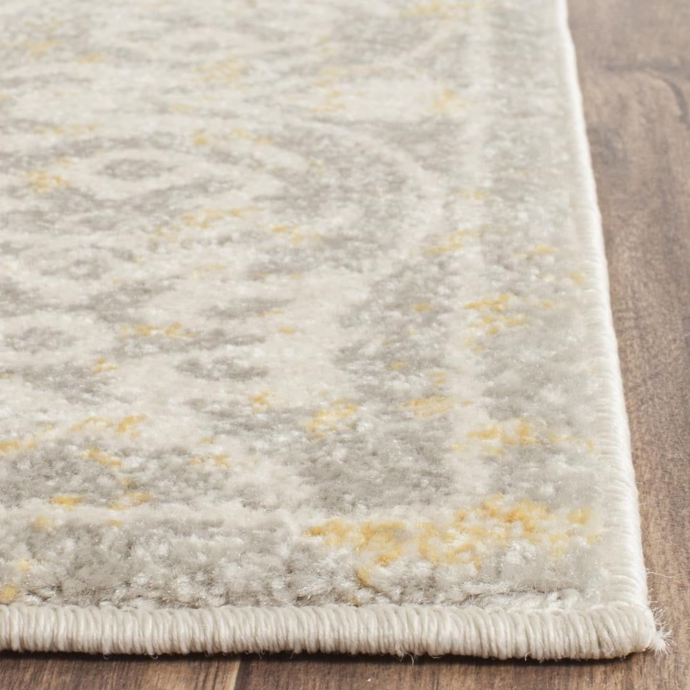 Ivory and Gray High Pile Synthetic Area Rug, 6'7" x 9'