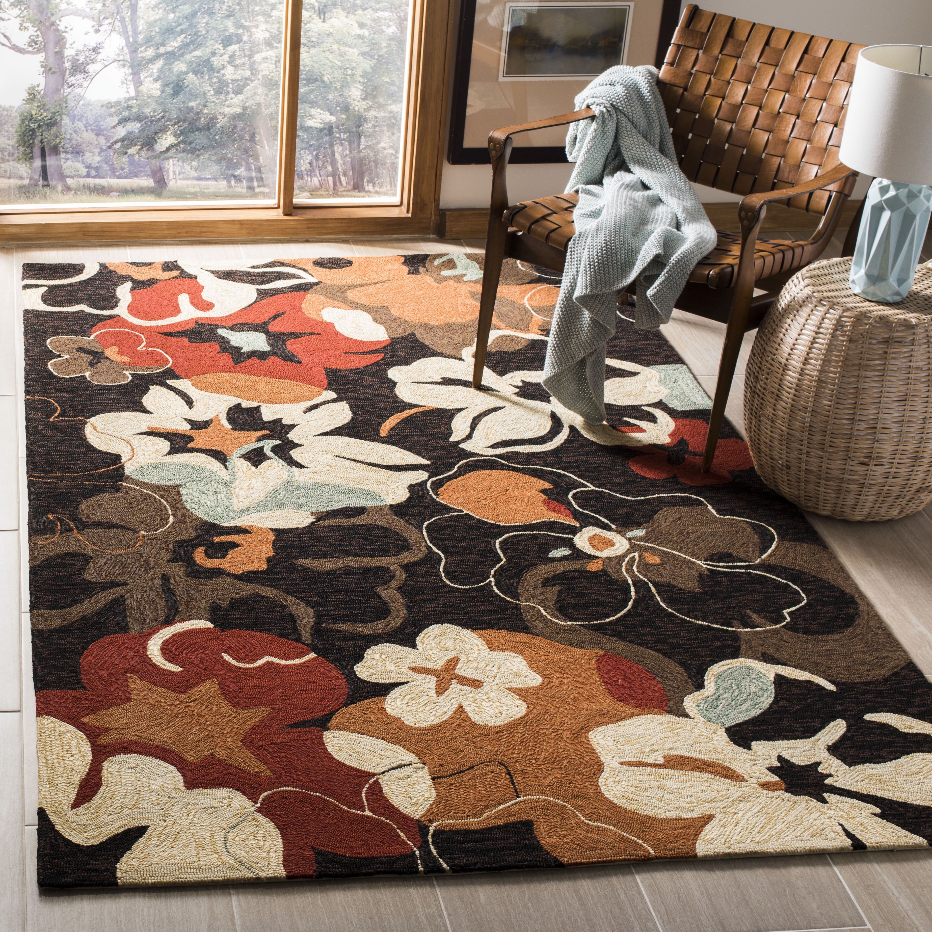 Handmade Floral Black & Orange Synthetic Area Rug - 42"x6"