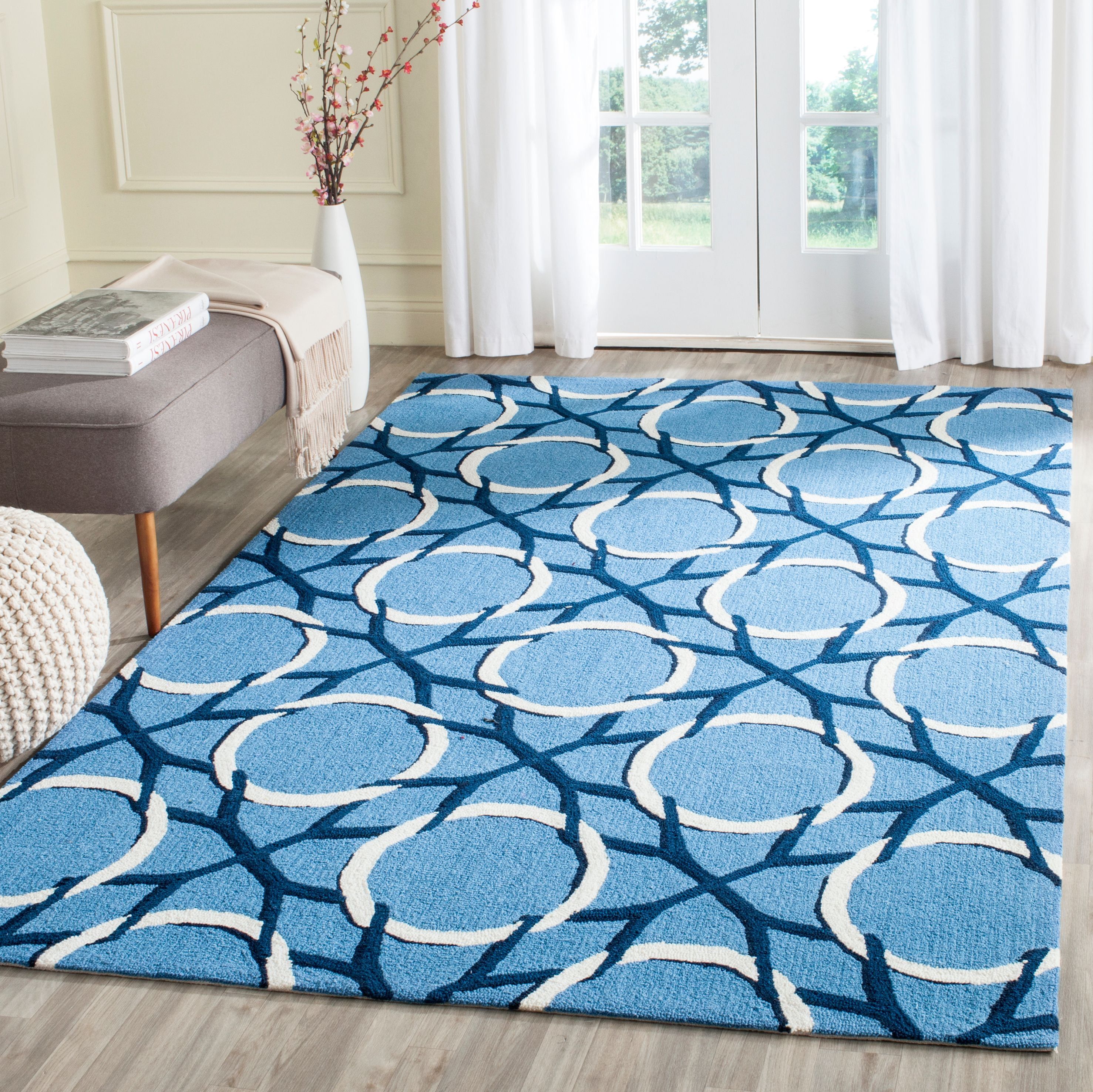 Handmade Blue and Ivory Floral Synthetic Rug, 5' x 8'