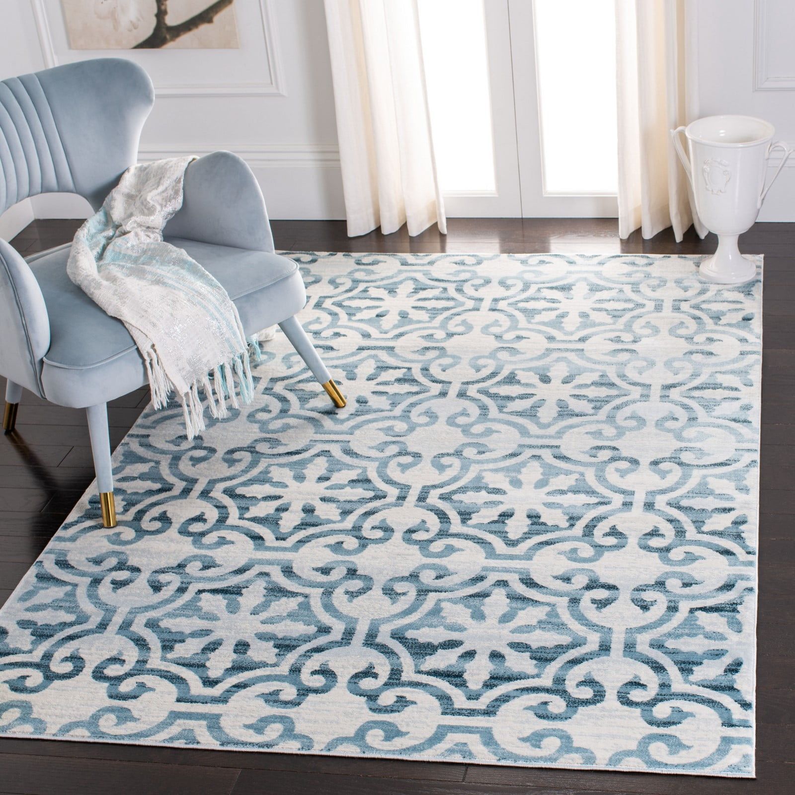 Ivory and Navy Geometric Floral Synthetic Area Rug 4' x 6'