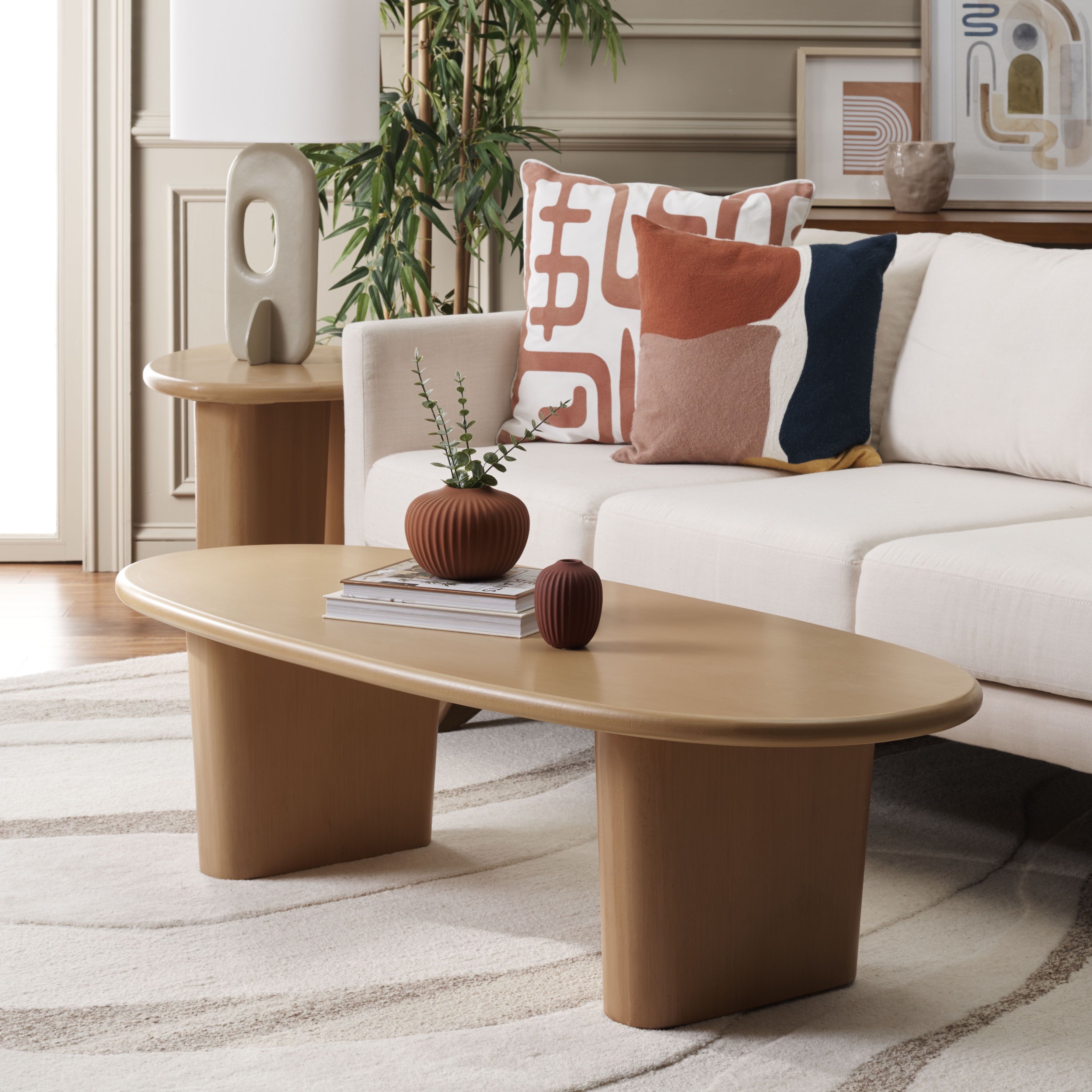 Natural Wood Oval Coffee Table with Sculptural Legs, 54"