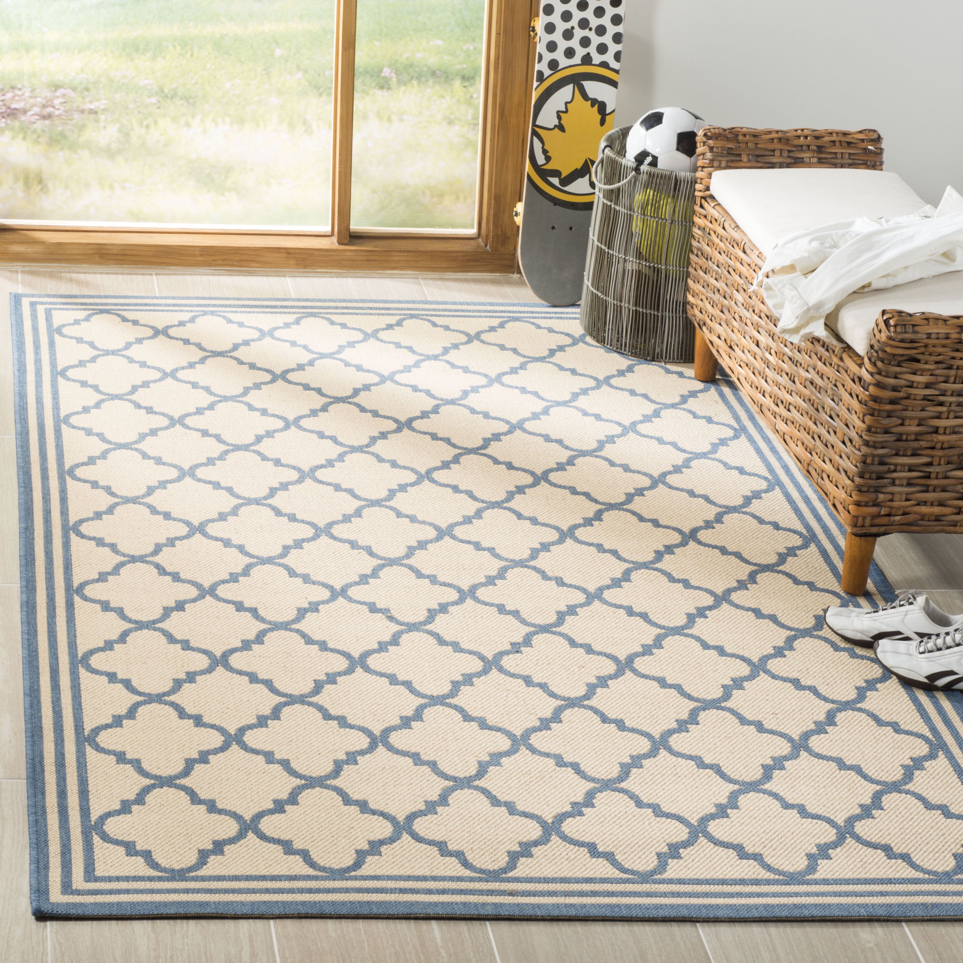 Cream/Blue Geometric Synthetic 4' x 6' Easy Care Area Rug