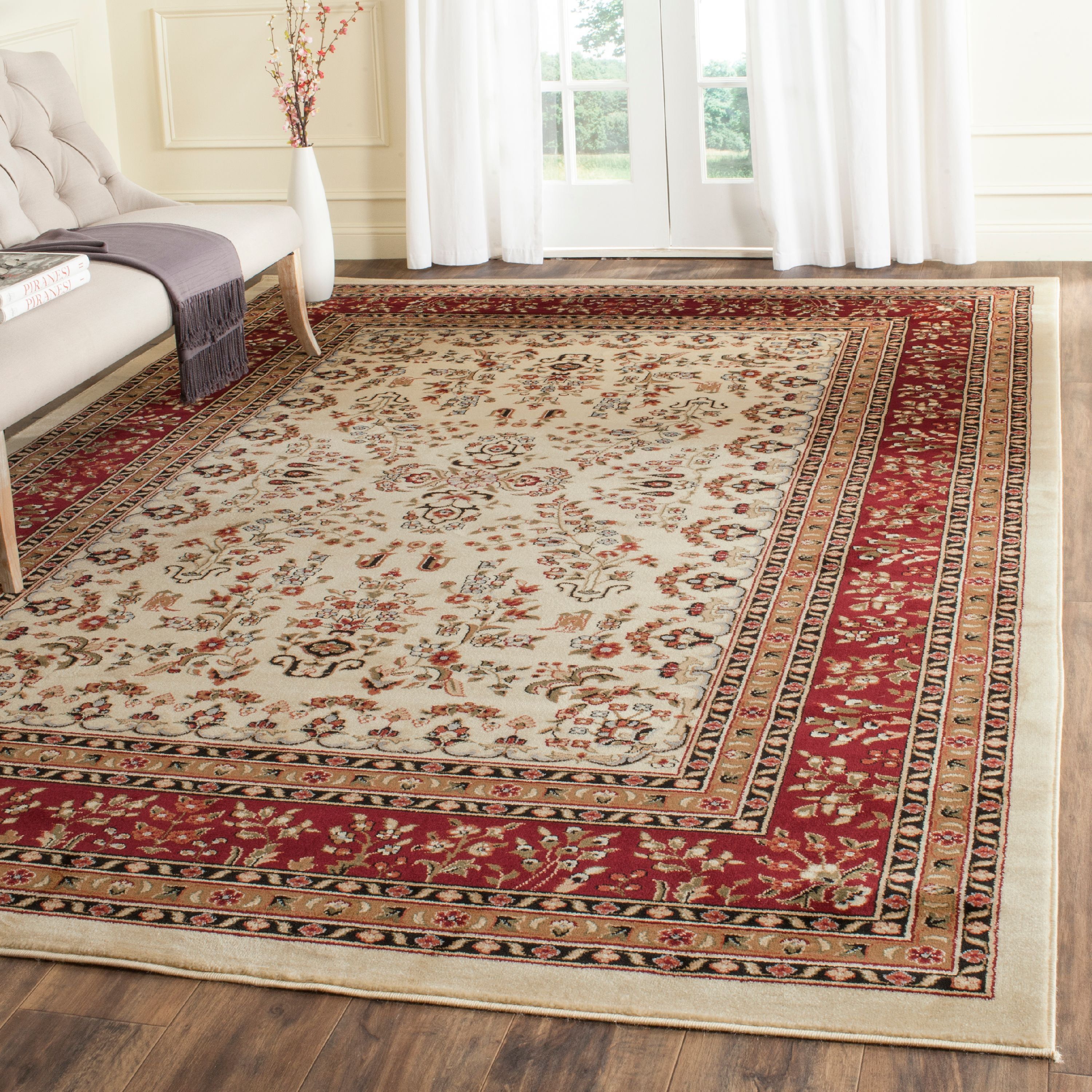 Rectangular 9' x 12' Red and Ivory Synthetic Area Rug