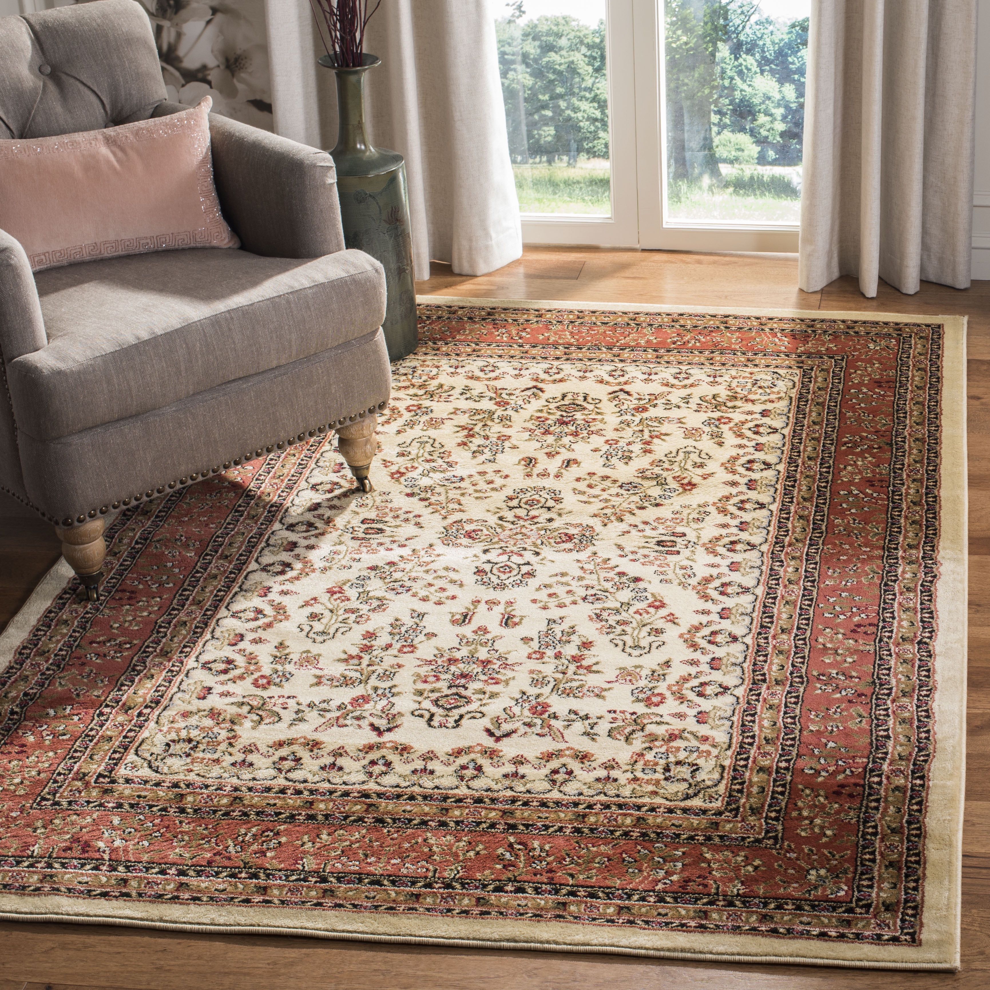 Ivory and Rust Floral 9' x 12' Synthetic Area Rug