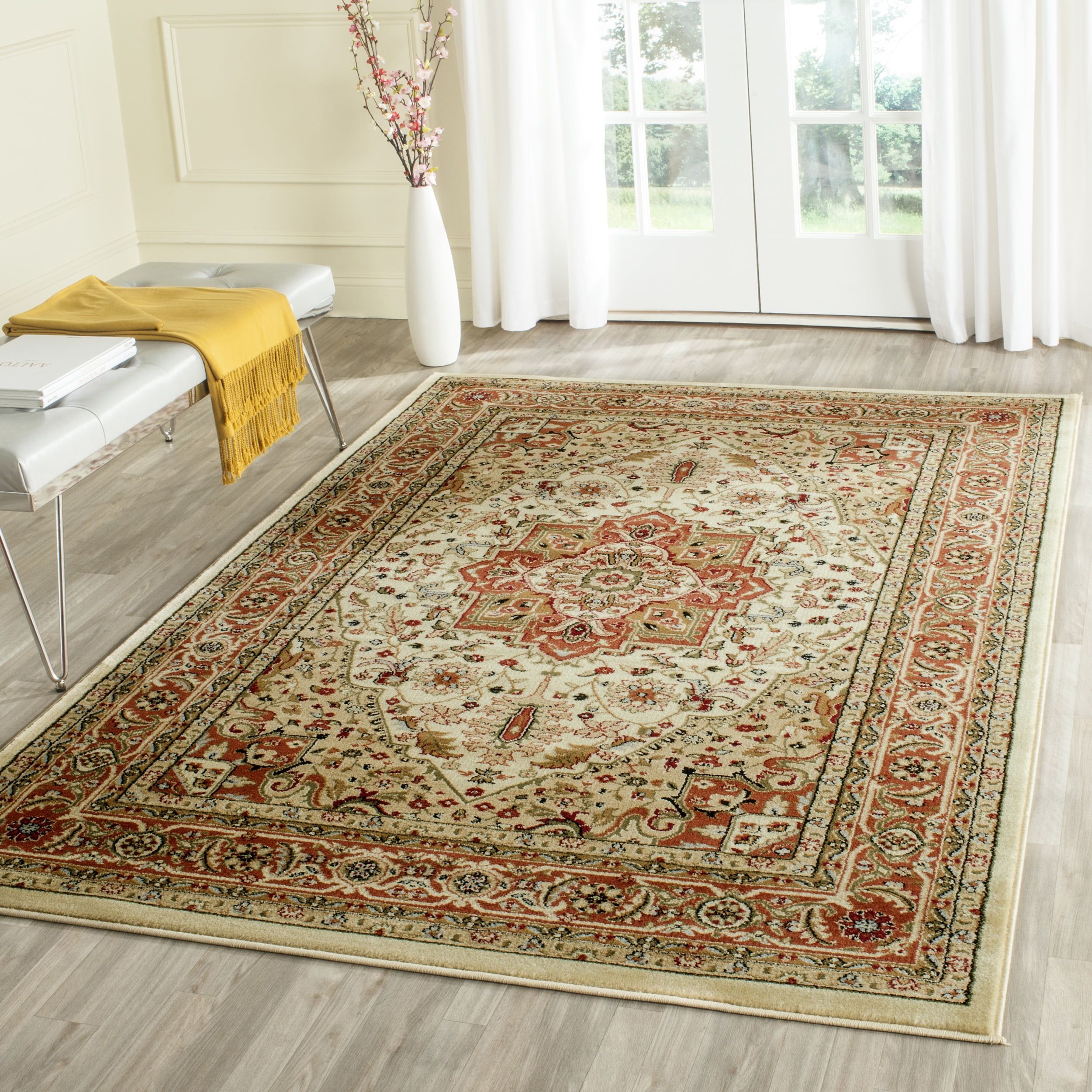 Ivory and Rust Synthetic Tufted Rectangular 10' x 14' Area Rug