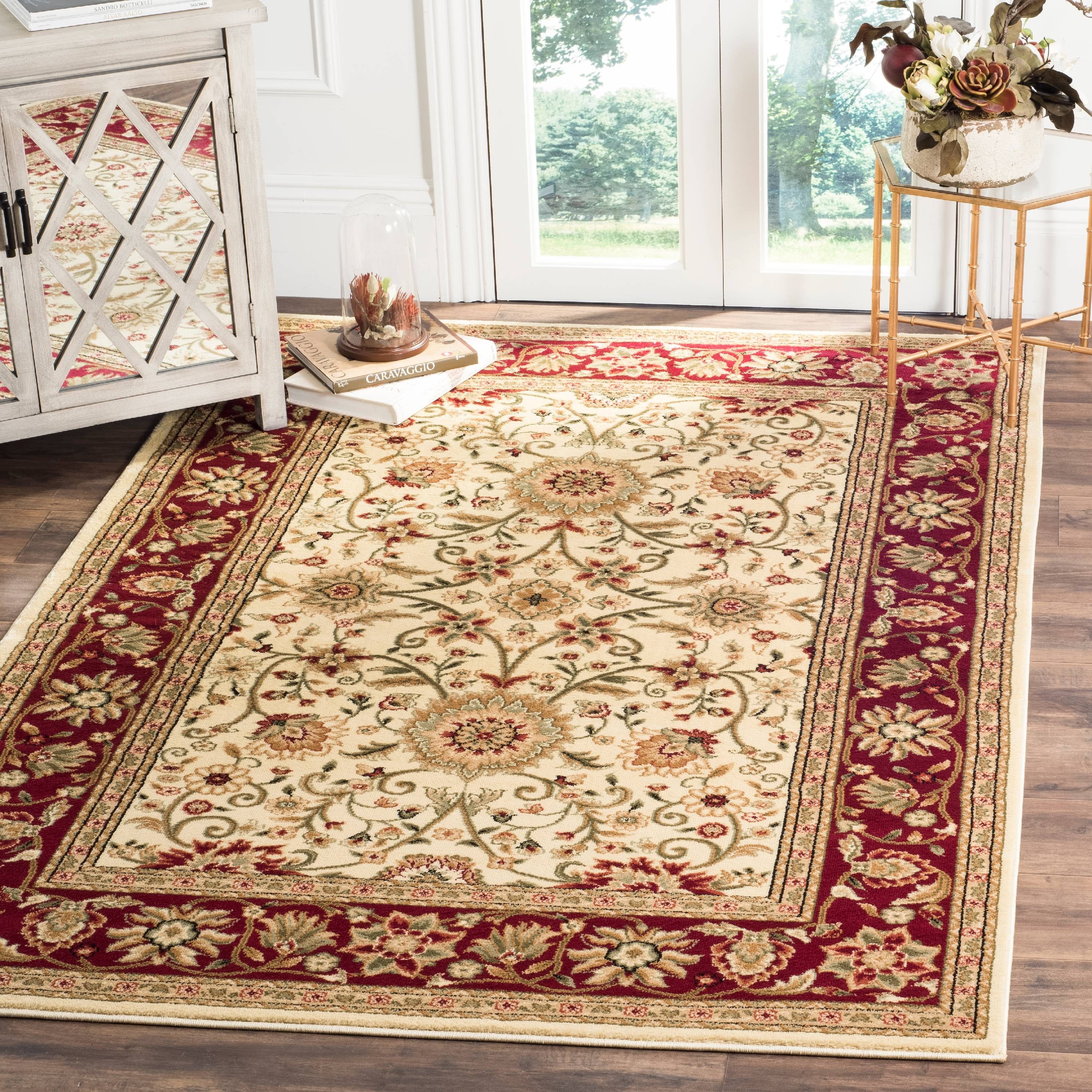 Ivory and Red Tufted Synthetic 9' x 12' Area Rug