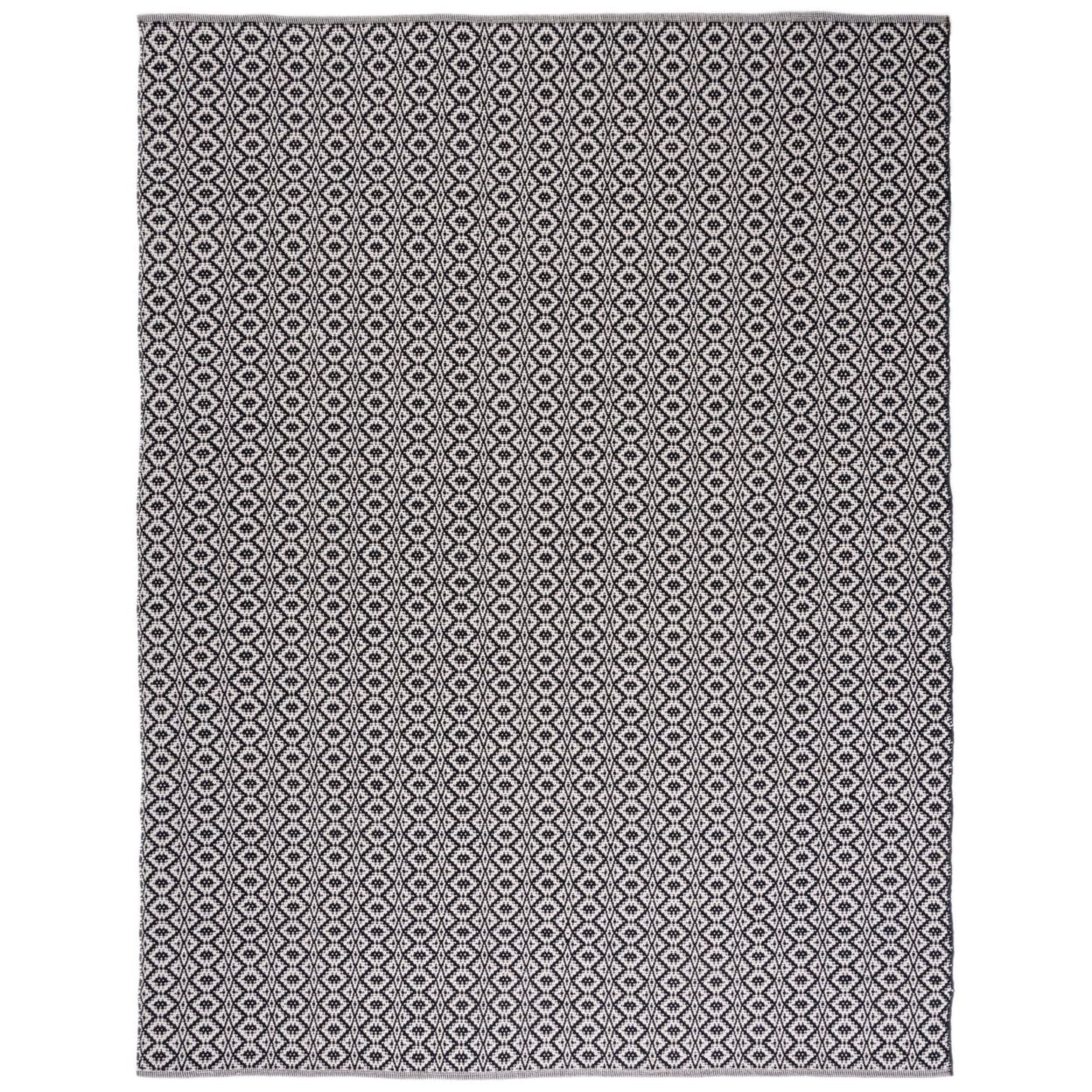 Ivory and Black Flat Woven Cotton 10' x 14' Area Rug