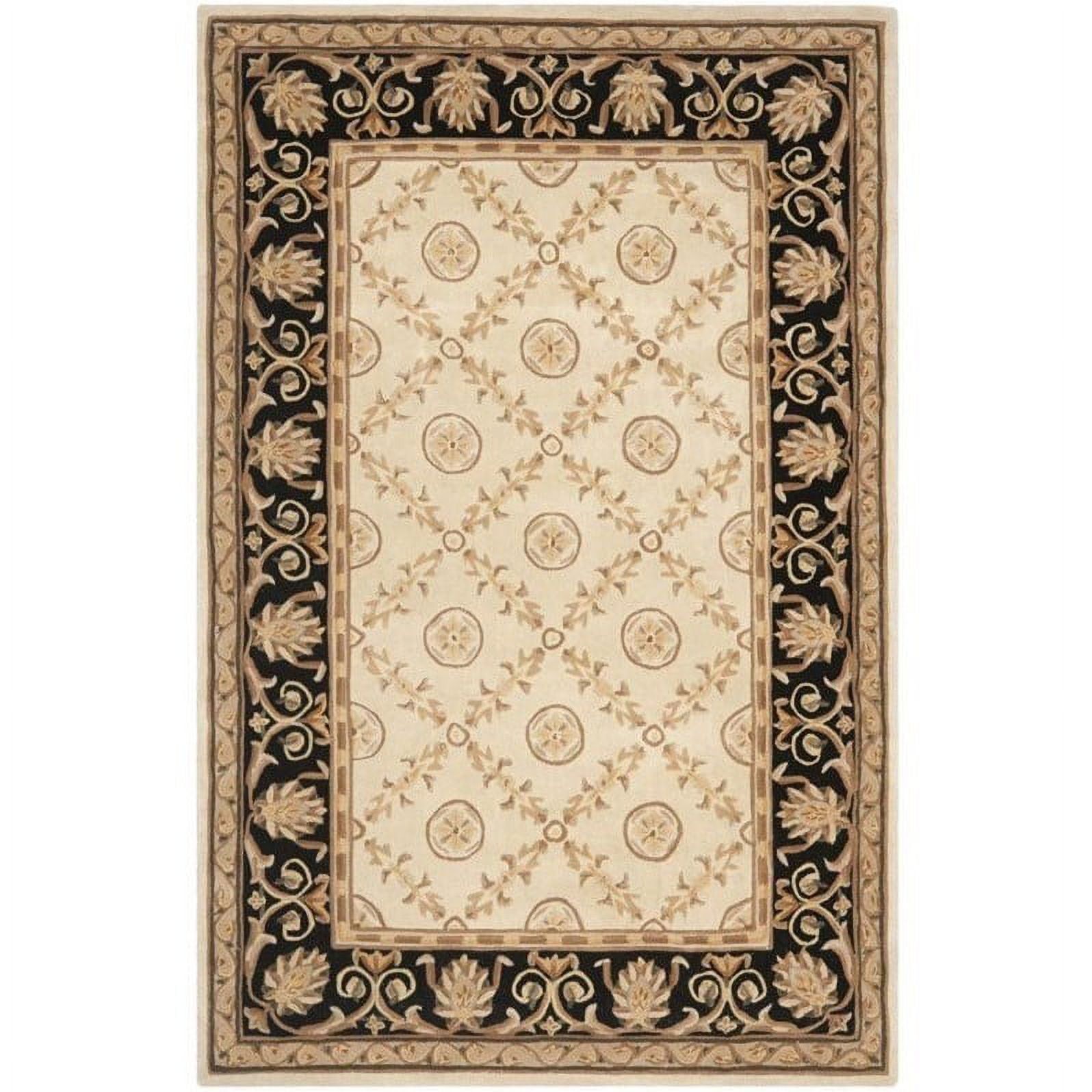 Ivory and Black Tufted Wool 4' x 6' Area Rug