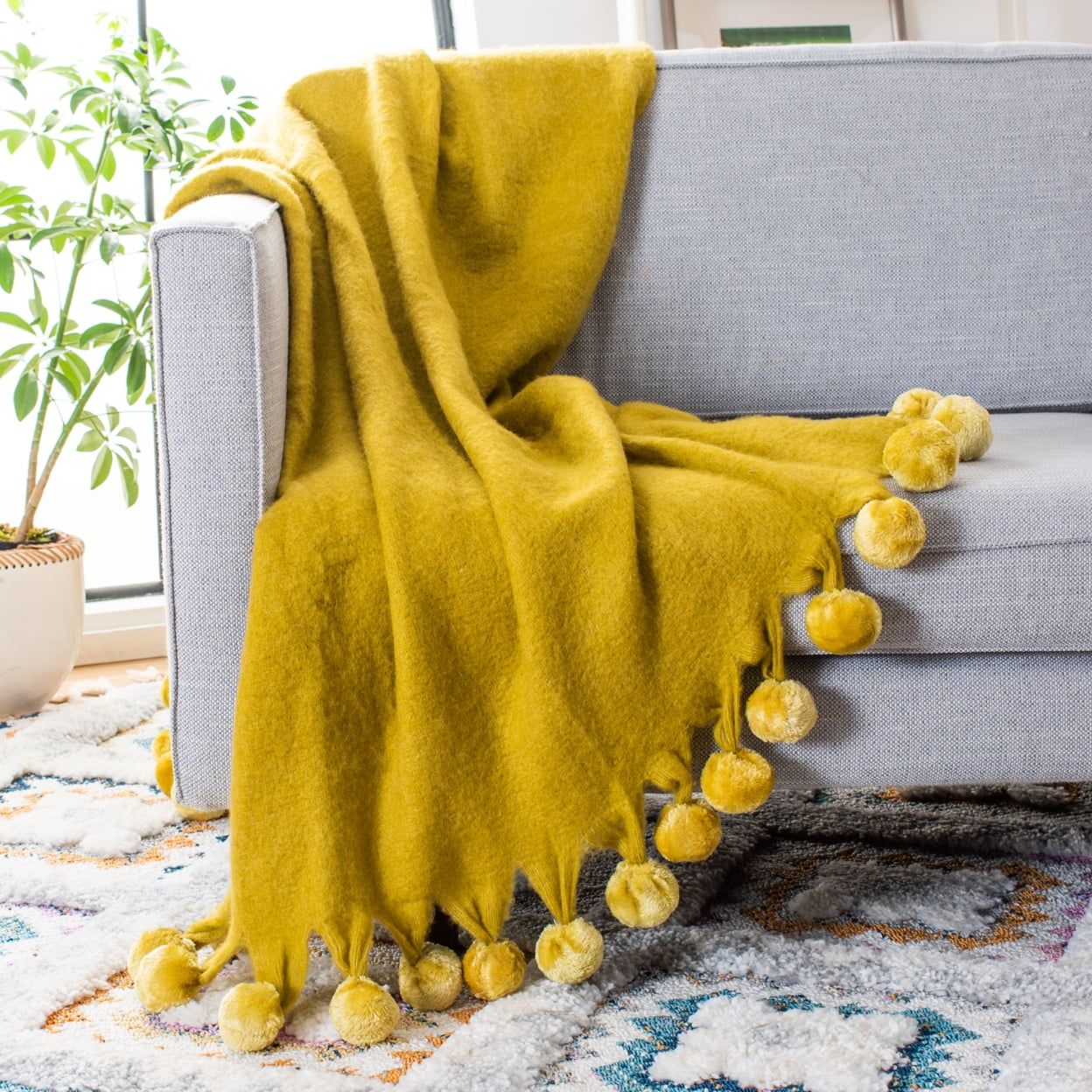 Shae Mustard Yellow Wool Throw Blanket with Pom Poms