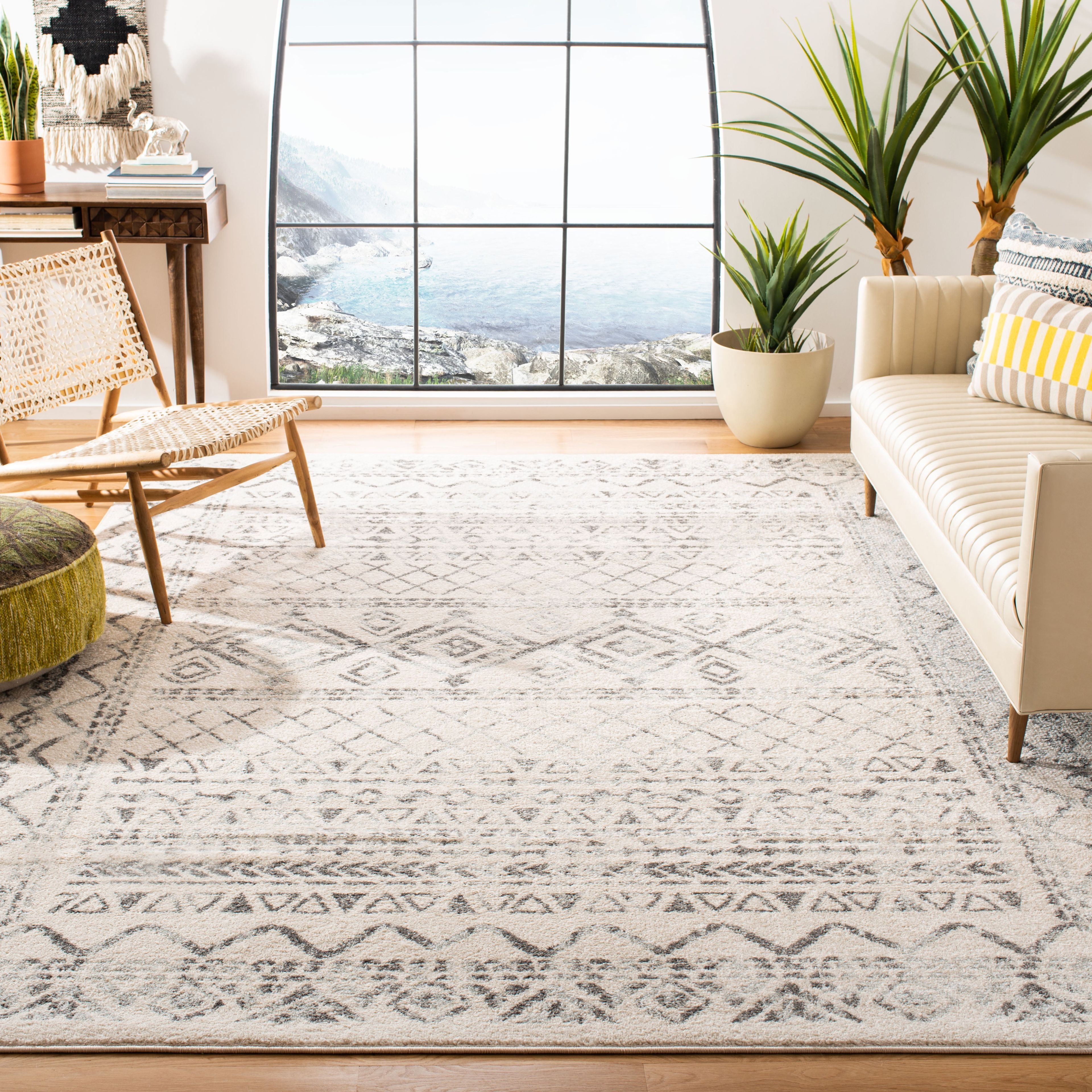 Ivory and Grey Synthetic Boho Chic Area Rug, 12' x 15'