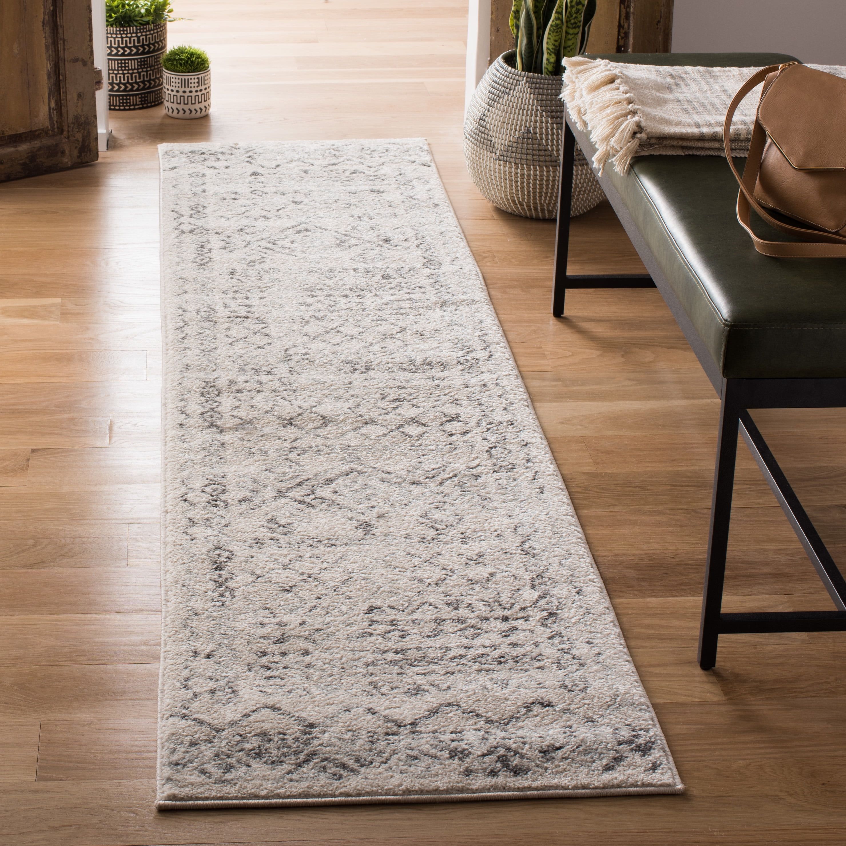 Ivory Geometric Synthetic 2' x 11' Easy-Care Runner Rug