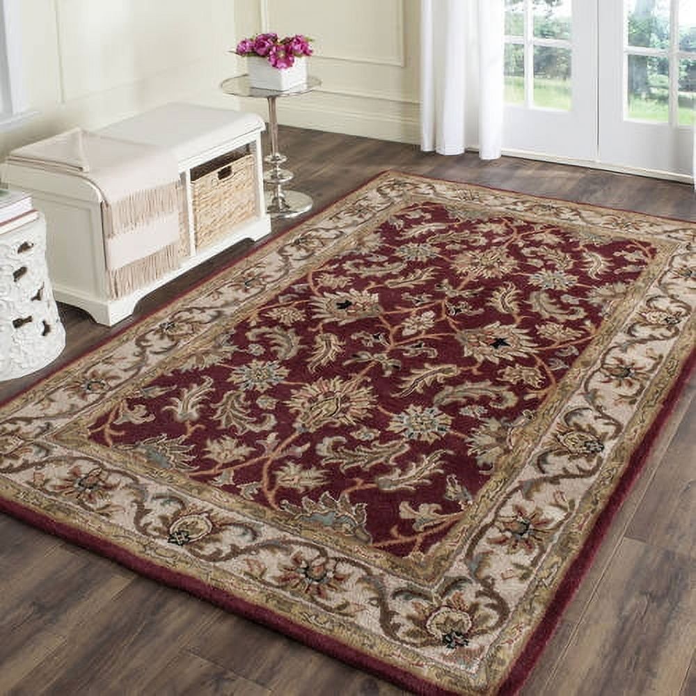 Handmade Tufted Red/Ivory Wool Oval 9' x 12' Area Rug