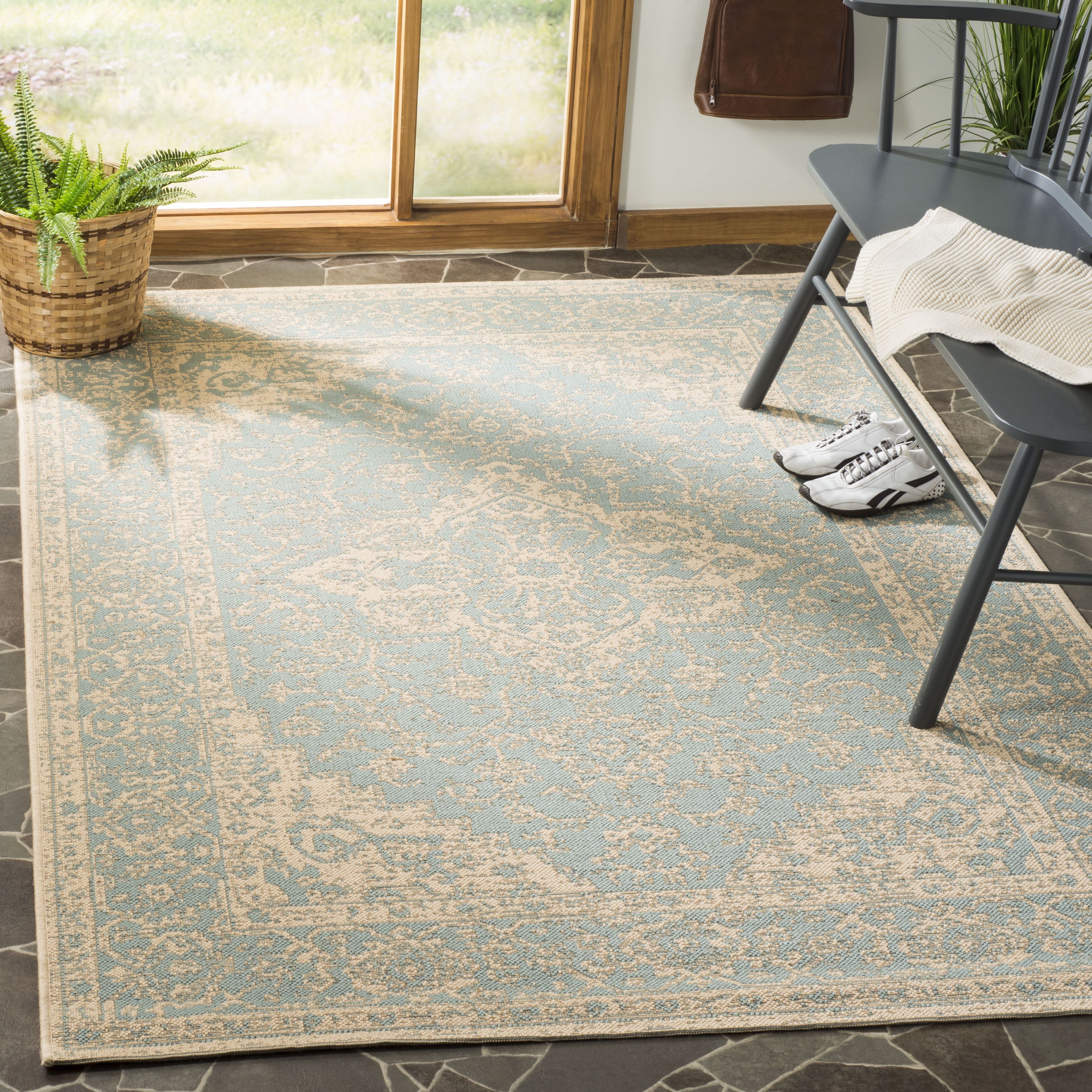 Aqua and Cream Geometric 8' x 10' Easy Care Area Rug