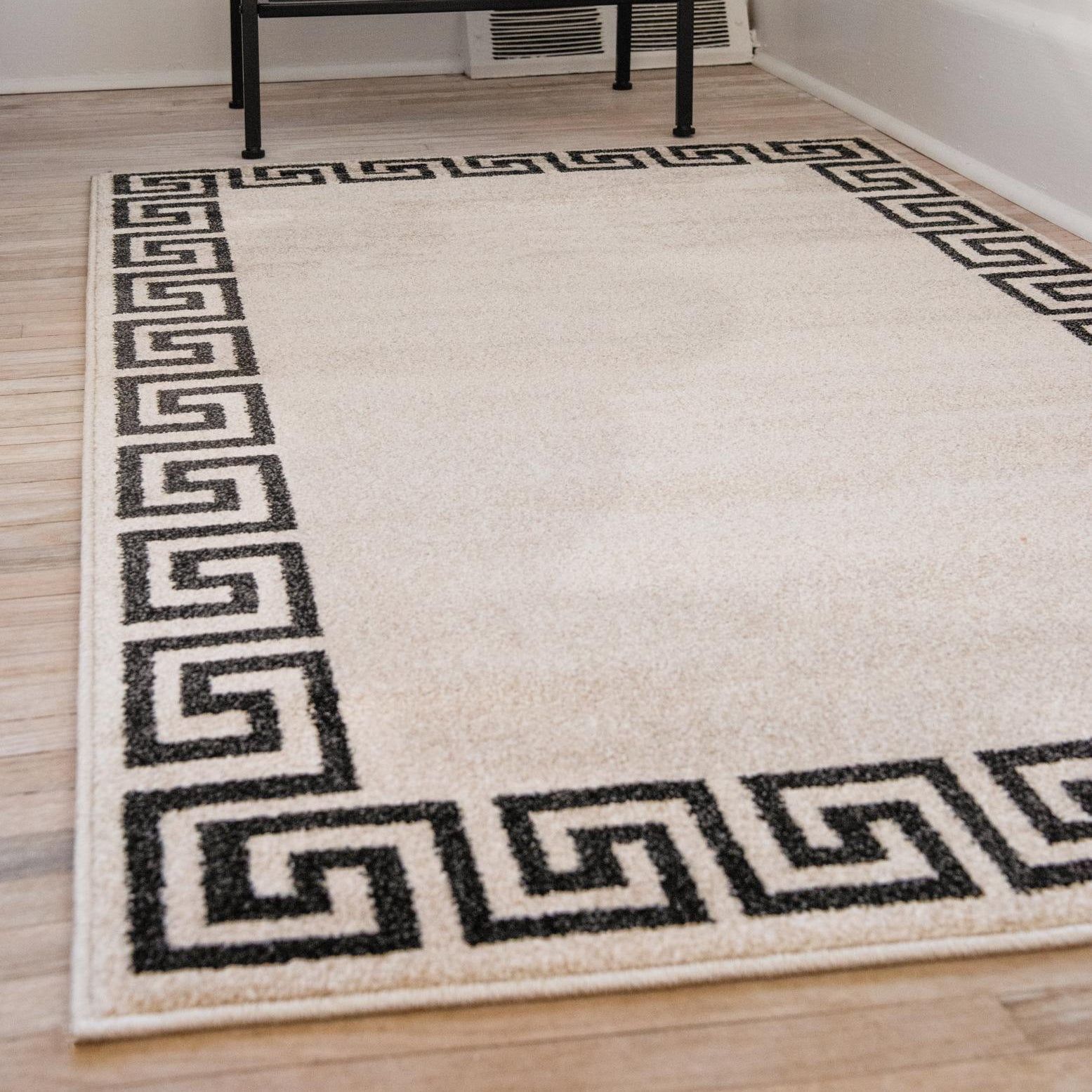 Athens Beige and Black Geometric Border 5' x 8' Area Rug