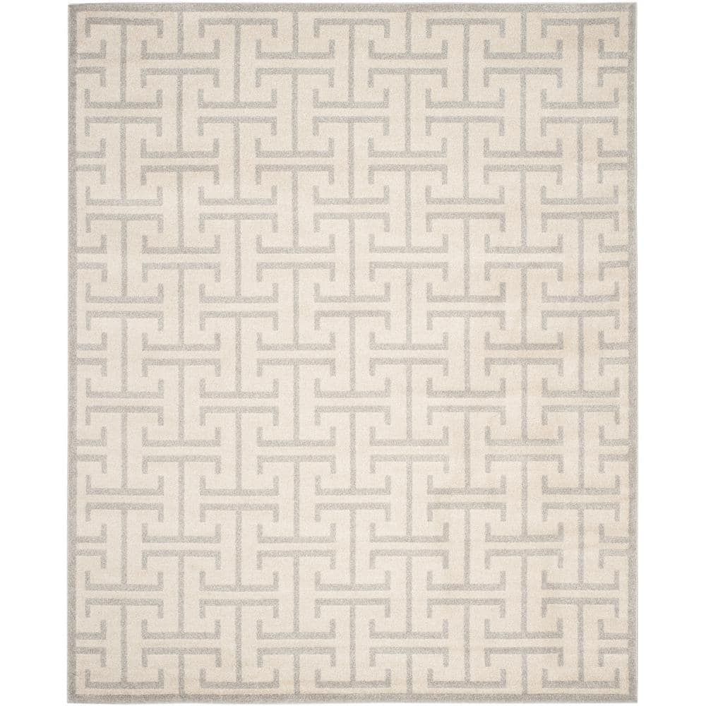 Ivory and Light Gray Rectangular 9' x 12' Synthetic Rug