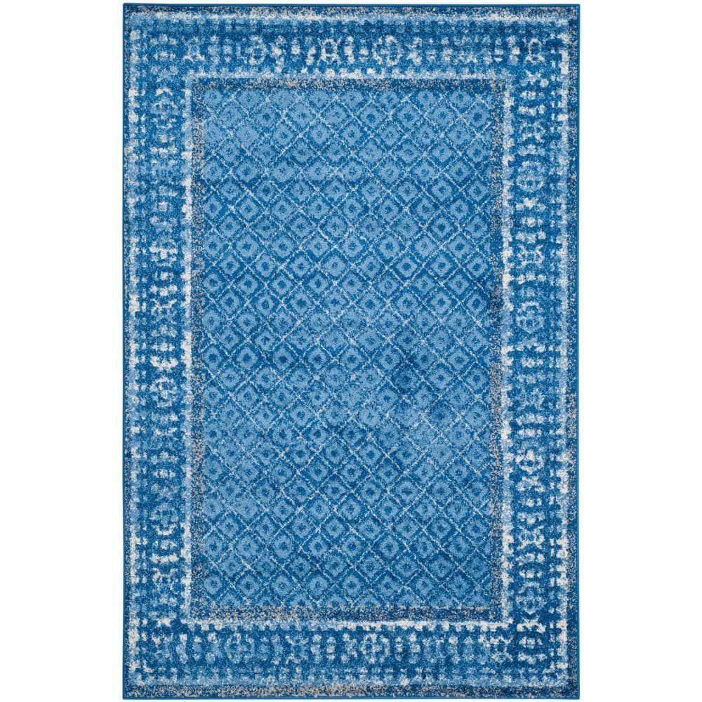 6' x 9' Blue Geometric Synthetic Area Rug