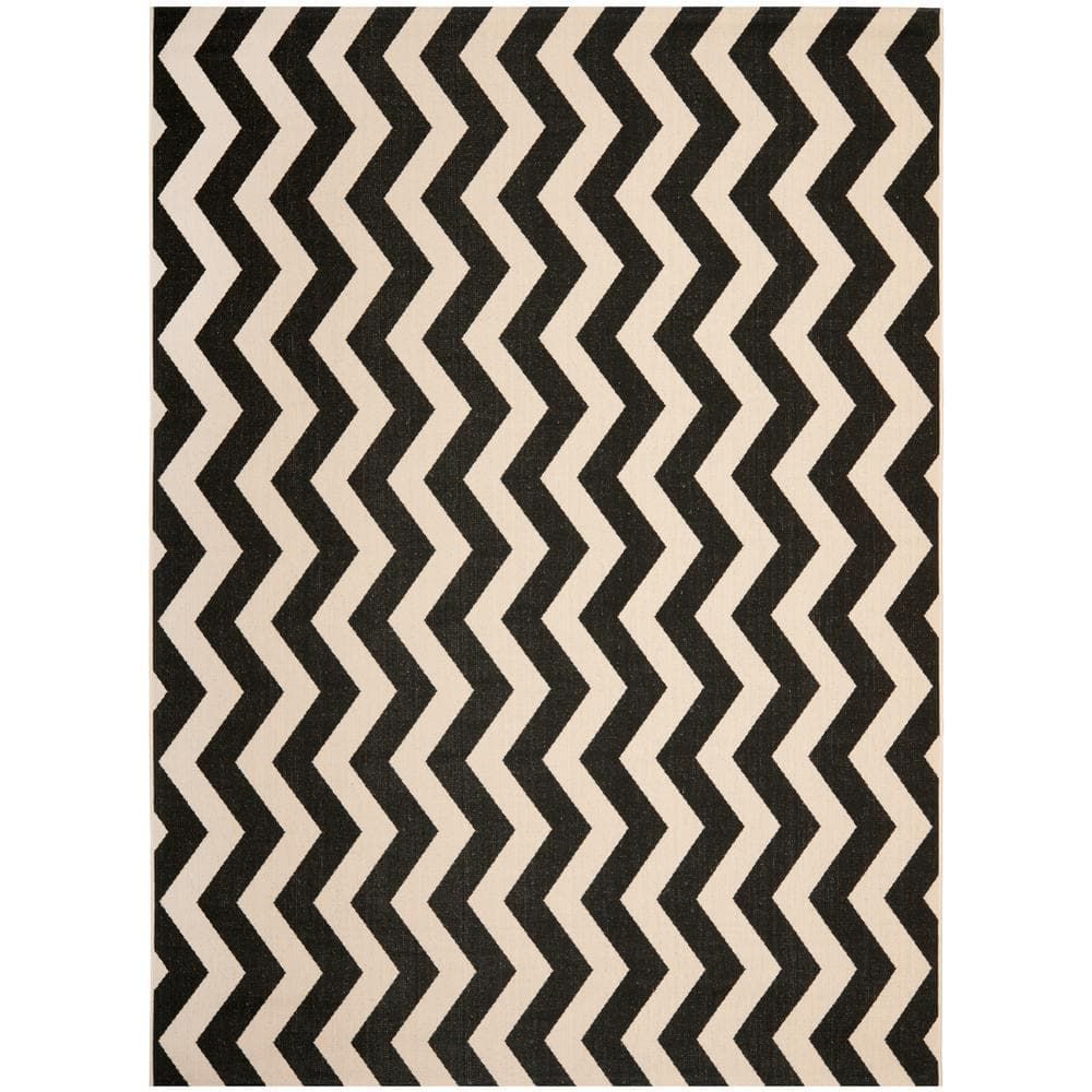 Courtyard Collection 54" Round Black/Beige Synthetic Area Rug