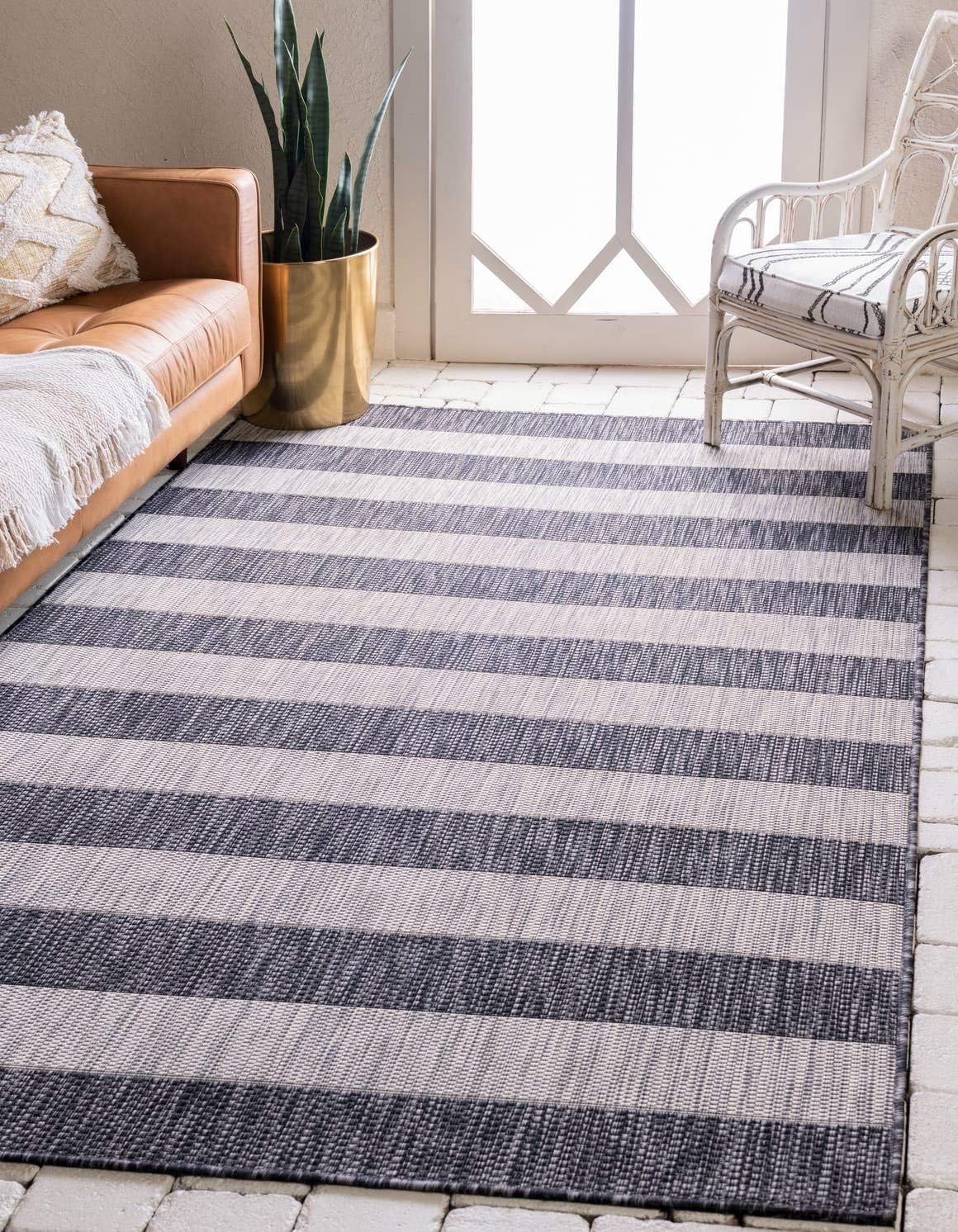 Charcoal Gray and Black Striped Synthetic Outdoor Rug 7' x 10'