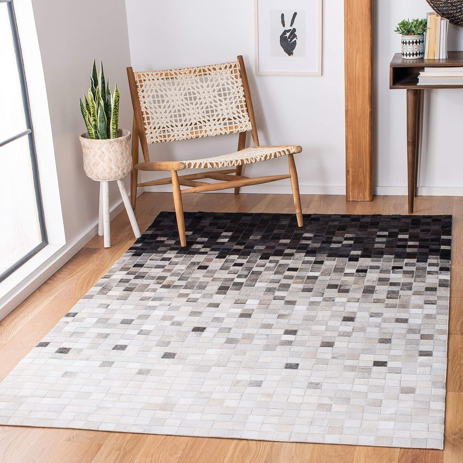 Handmade Black and White Geometric Cowhide Area Rug