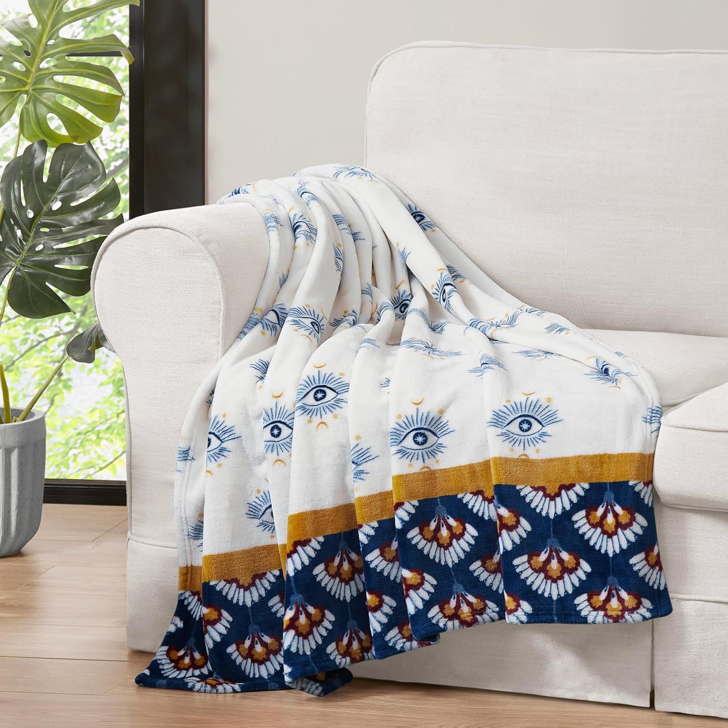 Celeste White and Navy Plush Throw Blanket with Eye Pattern