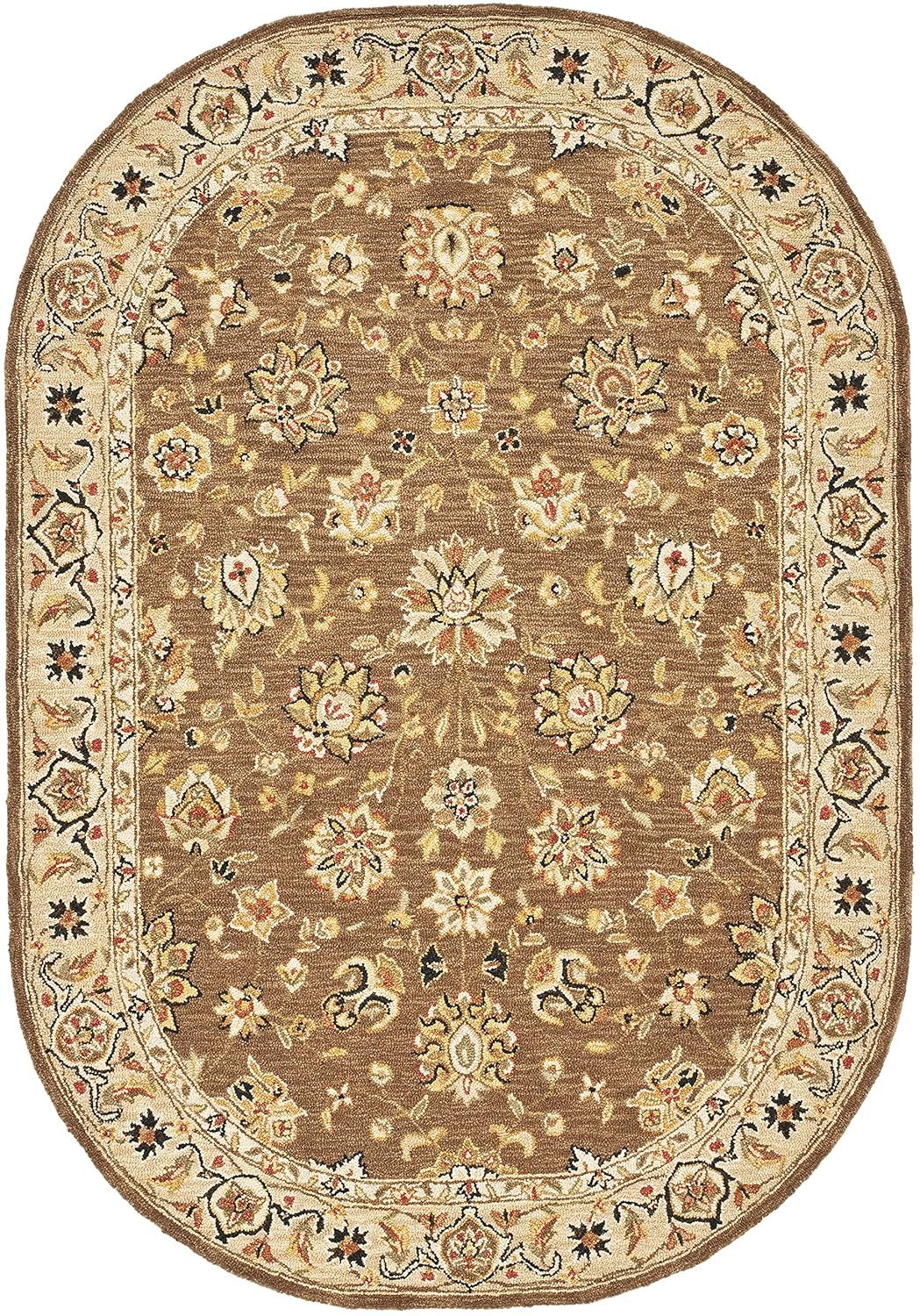 Handmade Oval Ivory and Brown Wool Area Rug