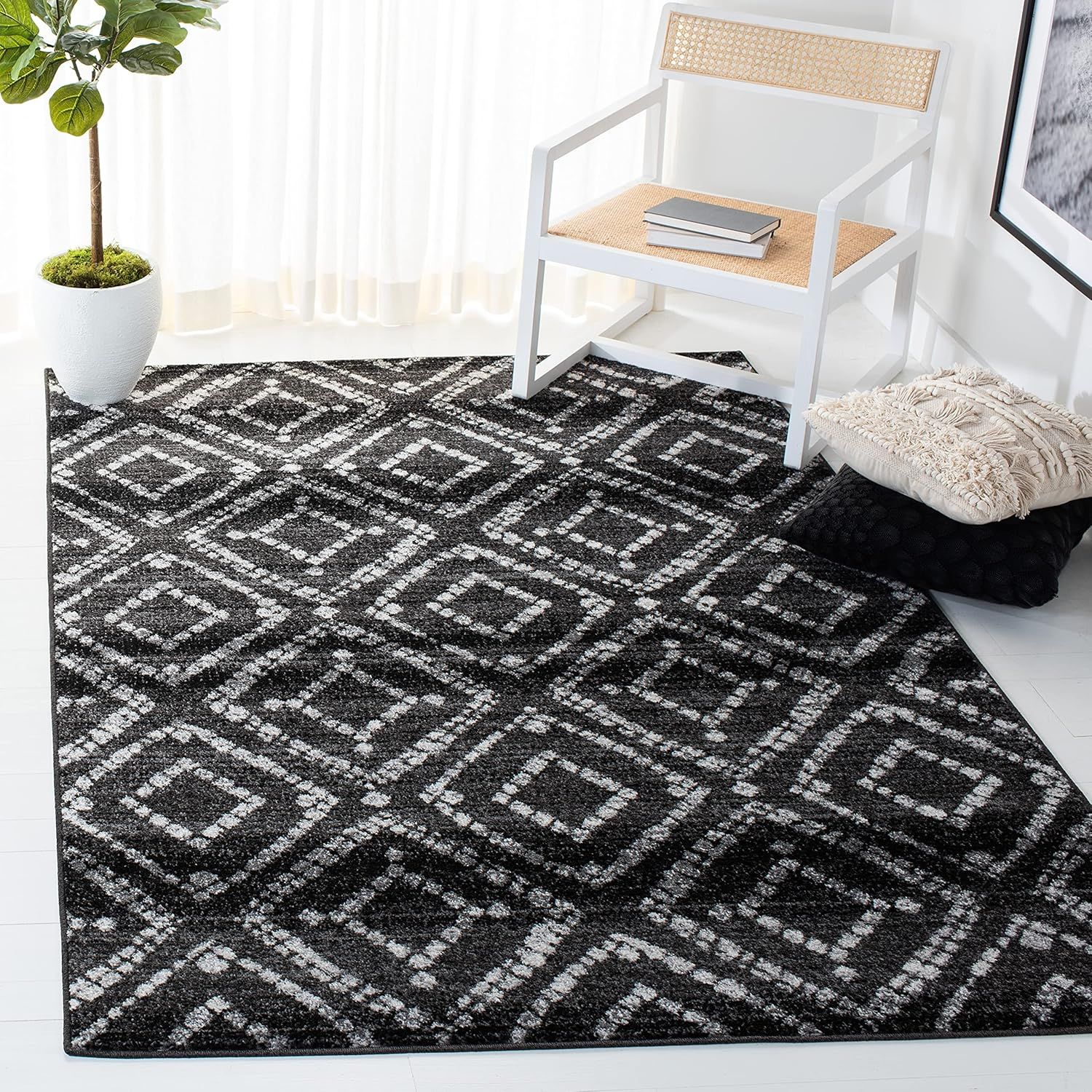 Black and Ivory Geometric Synthetic Rectangular Area Rug