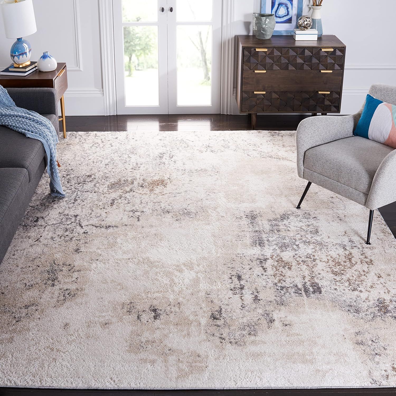 Ivory and Gray Abstract 10' x 14' Stain-Resistant Synthetic Rug