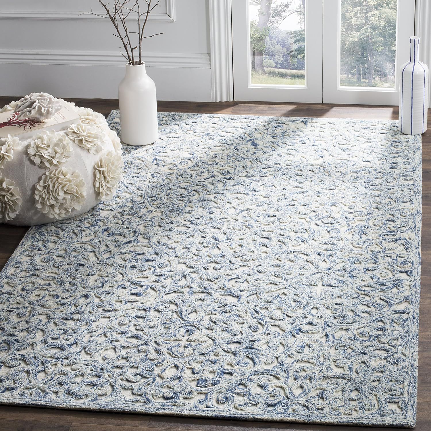 Handmade Blue and Ivory Wool 9' x 12' Tufted Area Rug