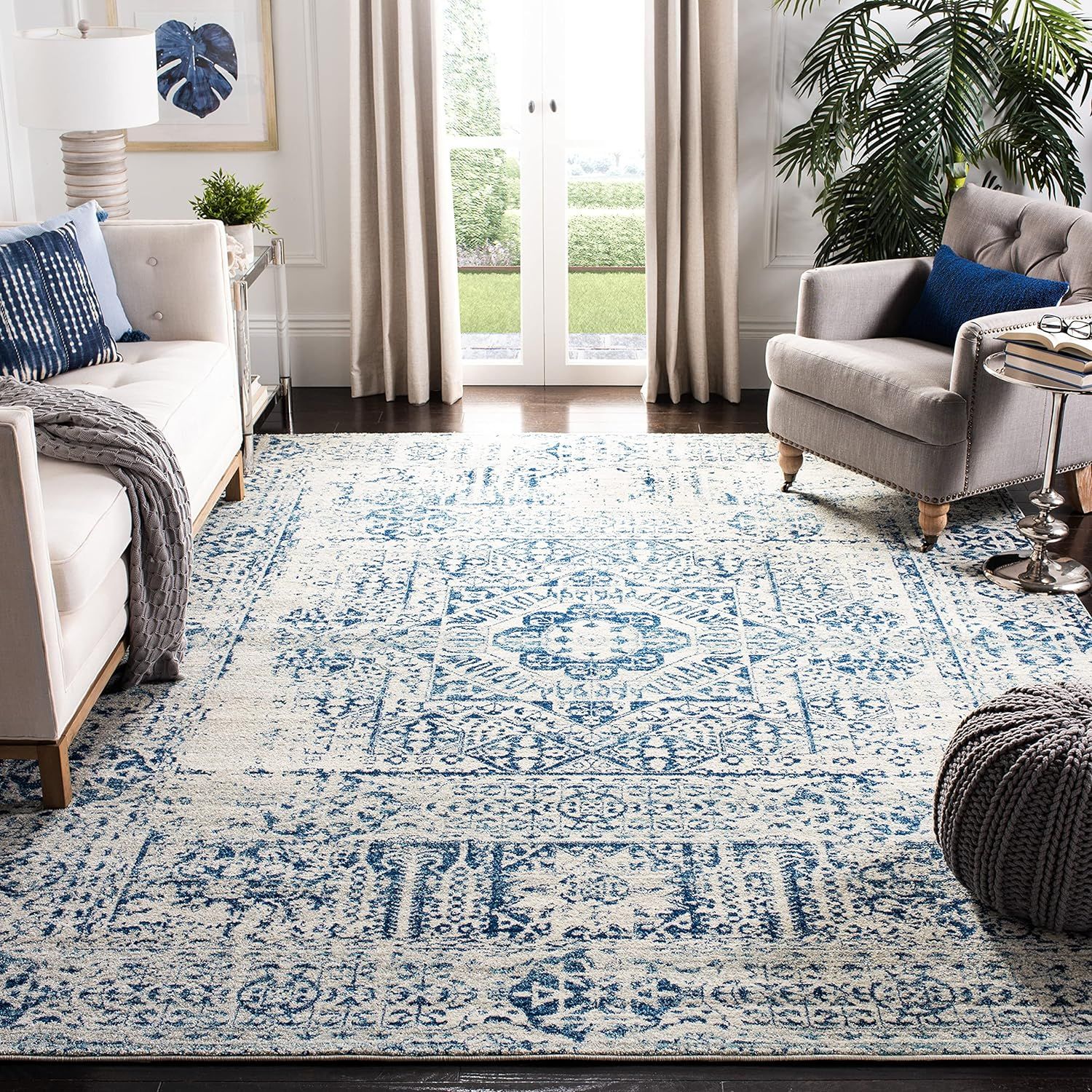 Ivory and Blue Synthetic 9' x 12' Reversible Area Rug