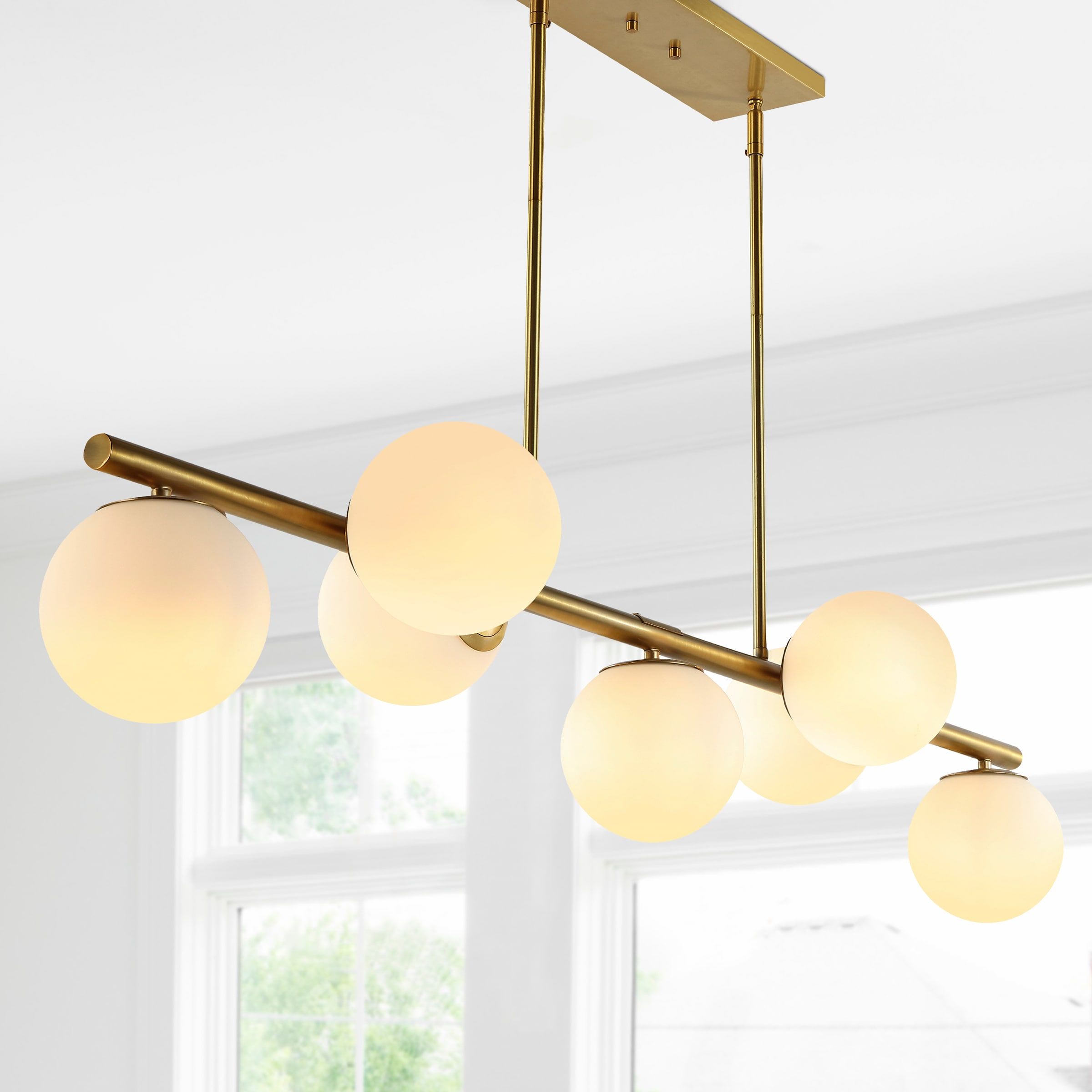 Gold Brass 53" Linear LED Pendant with Frosted Glass Globes