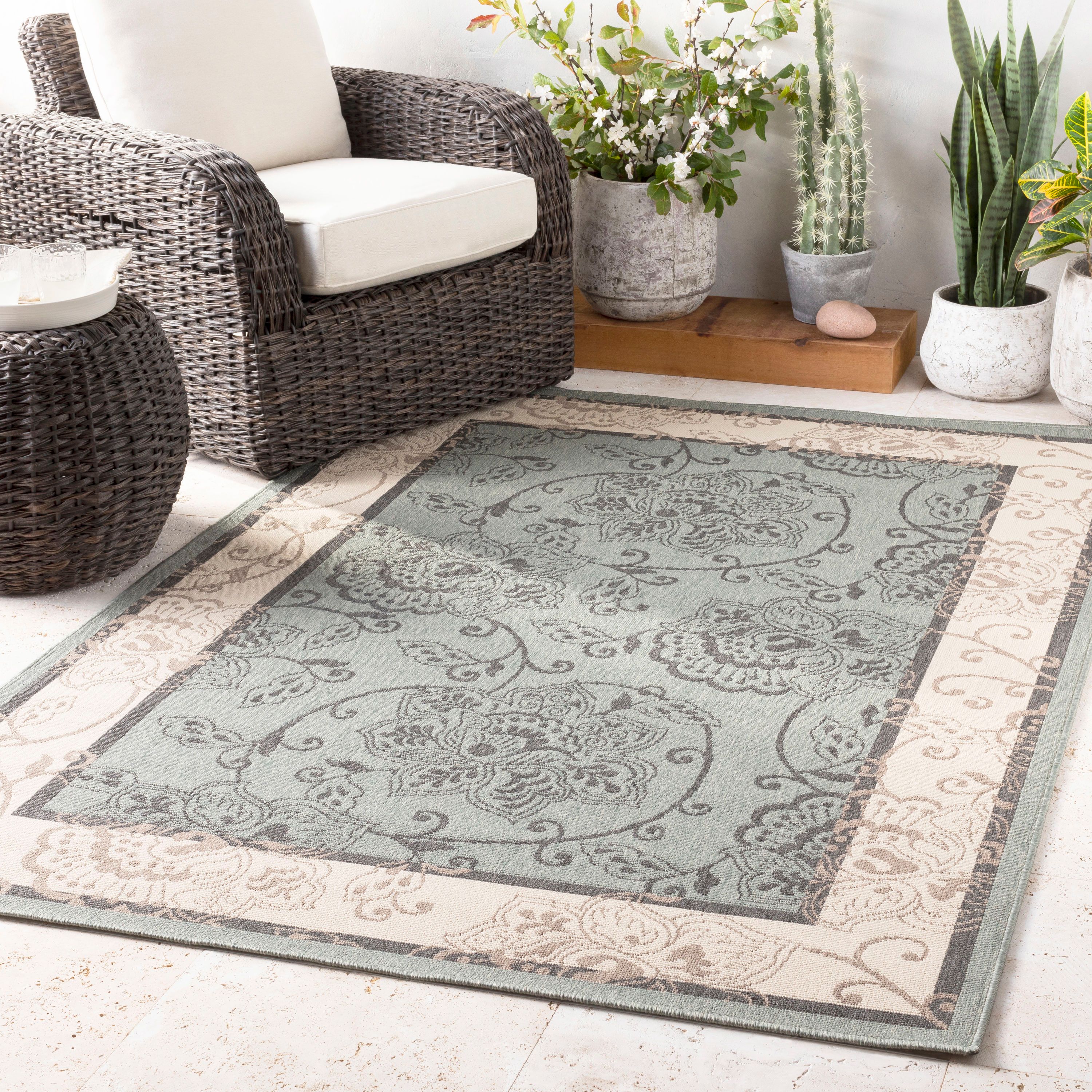 Reversible Black Synthetic 5'3" x 7'6" Low Pile Area Rug