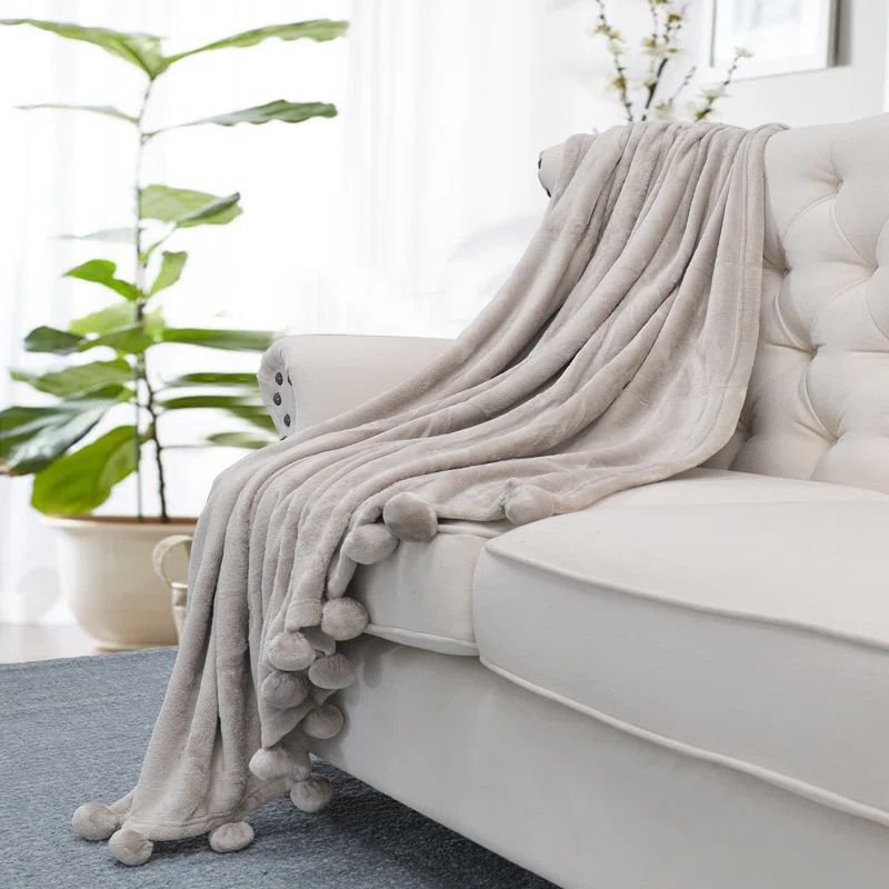 Cozy Kids Sherpa and Fleece Reversible Pom Pom Throw - 50" x 60"