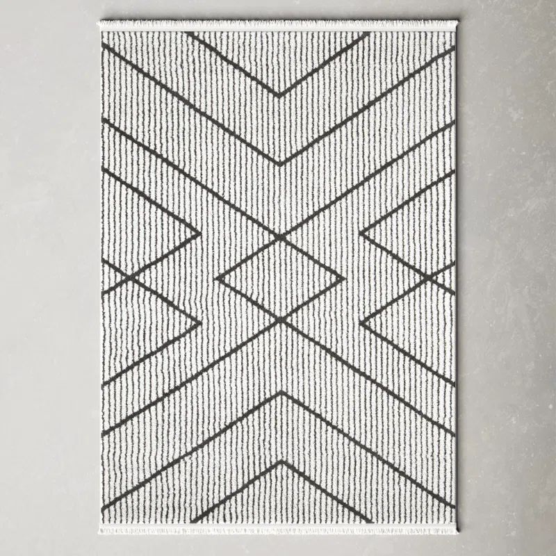 Lindy Southwestern Ivory Synthetic Rectangular Area Rug