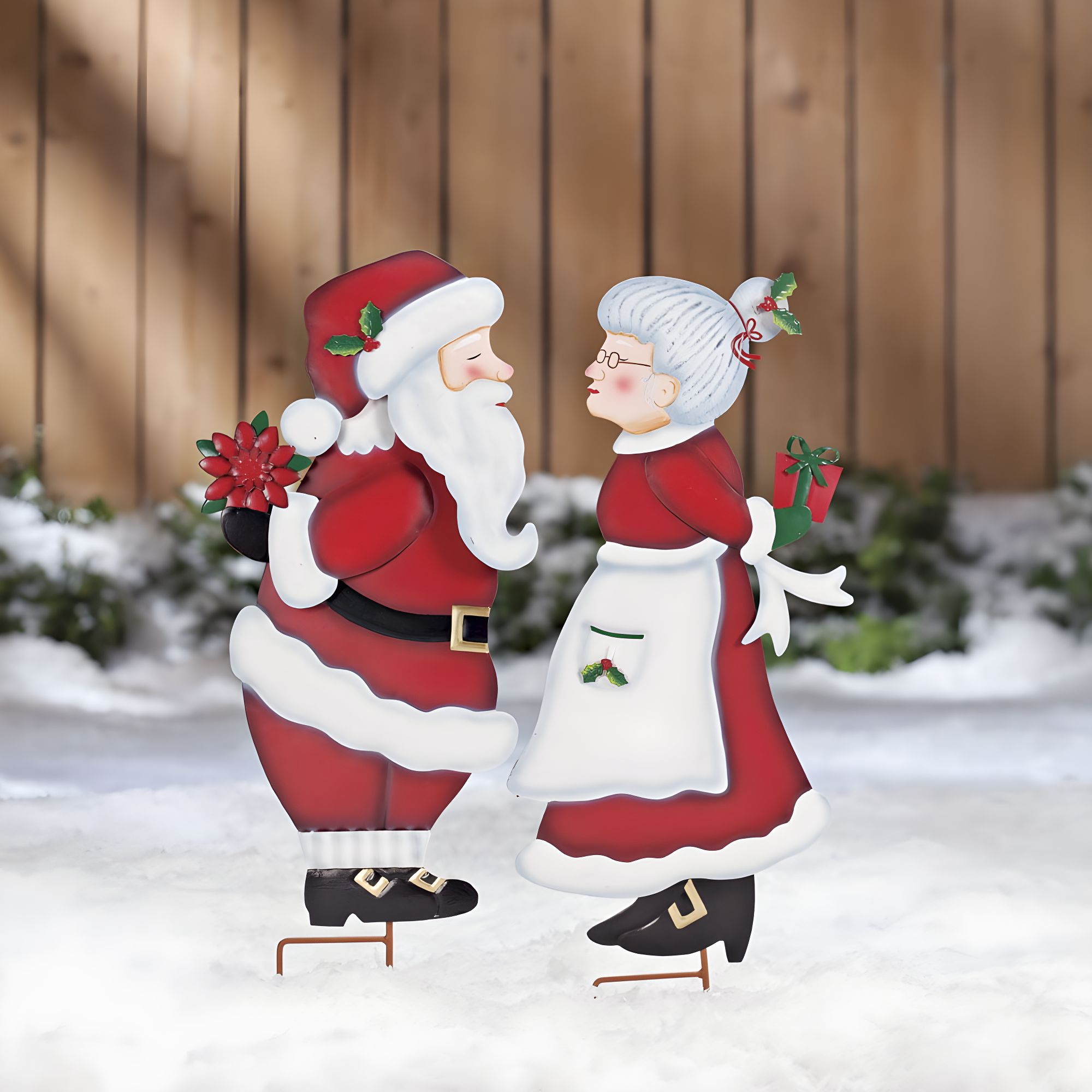 Kissing Santa and Mrs. Claus Painted Metal Garden Stakes