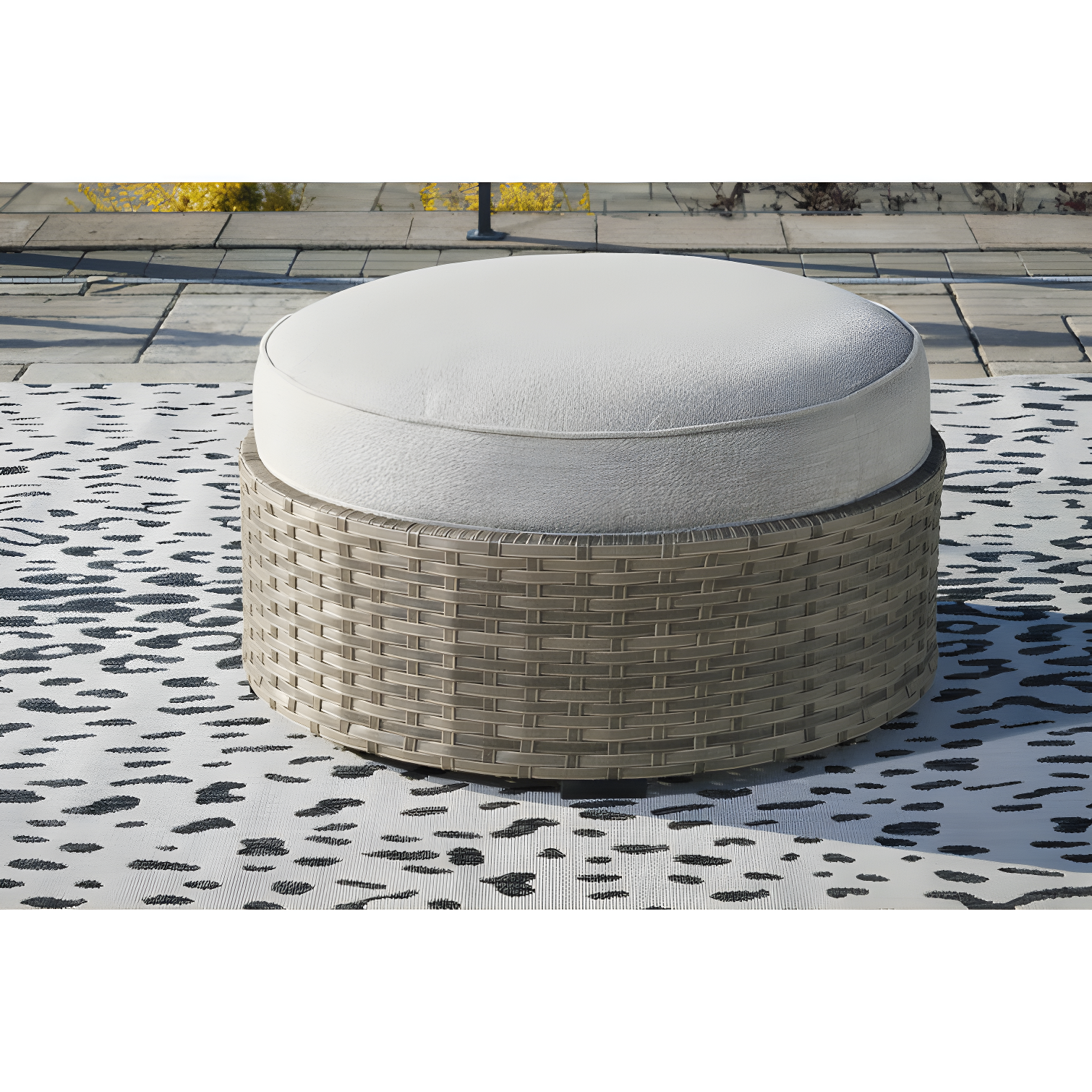 Calworth Handwoven Wicker Outdoor Ottoman with Performance Beige Cushion