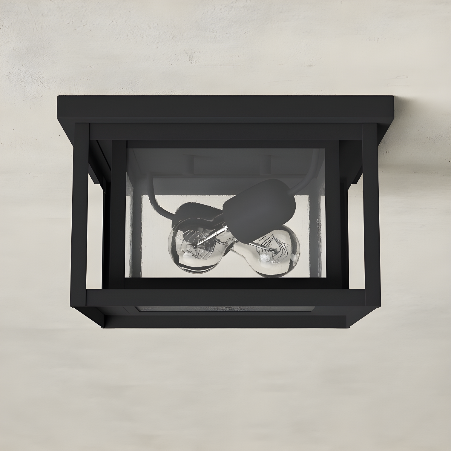 Hunnington Sleek Black 2-Light Outdoor Flush Mount with Clear Seeded Glass