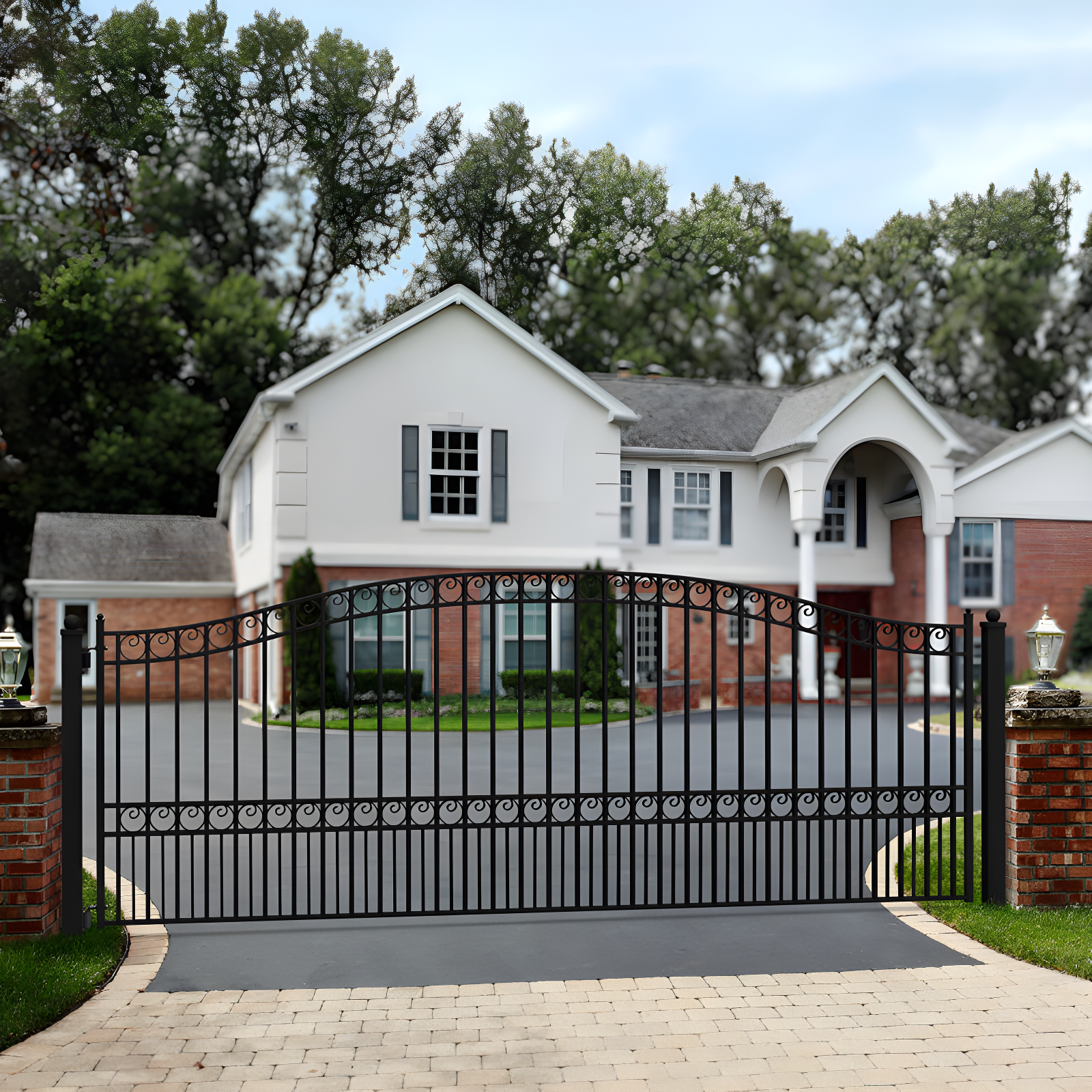 Black Steel Arched Driveway Gate with Ornamental Design