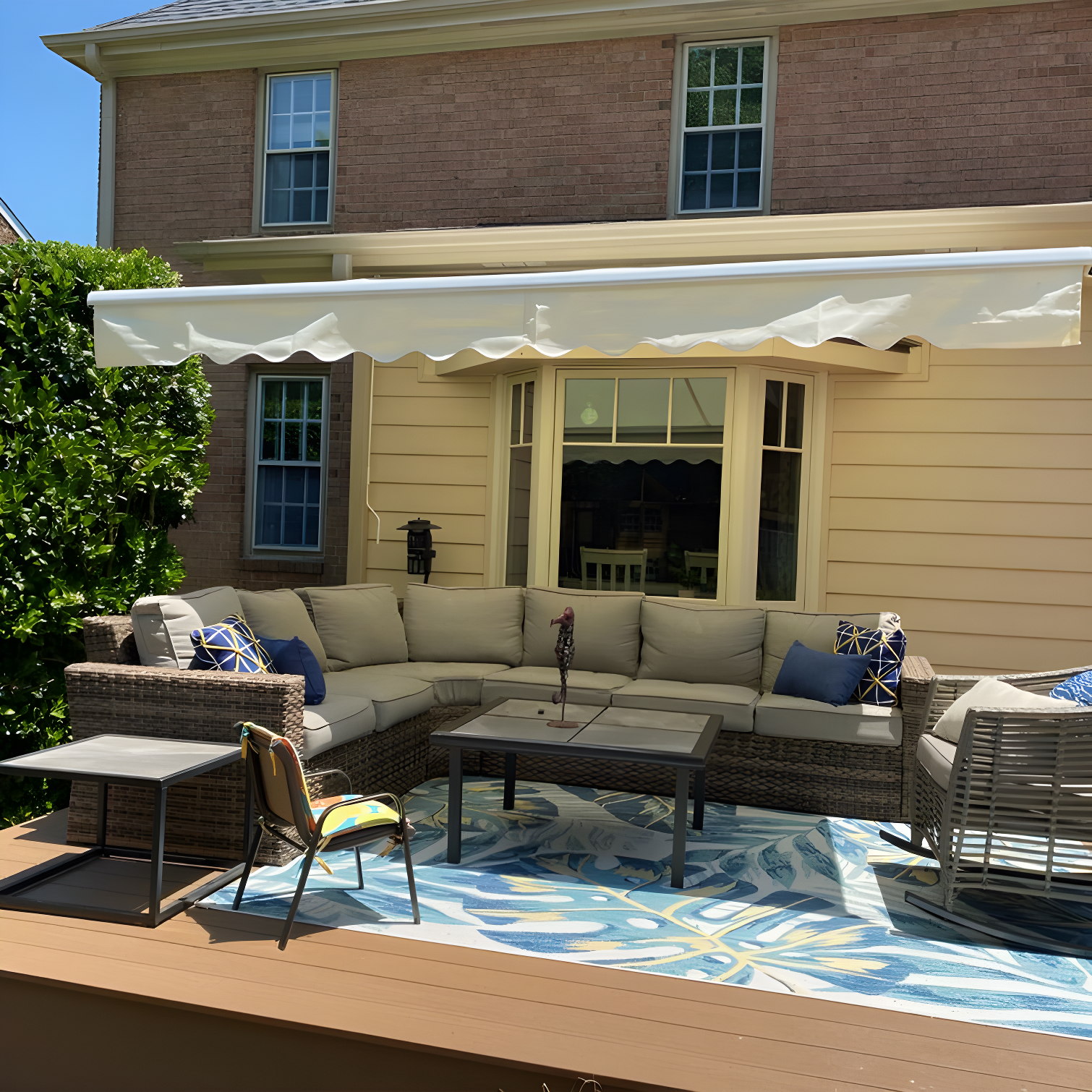 Ivory Motorized Retractable Patio Awning with White Frame