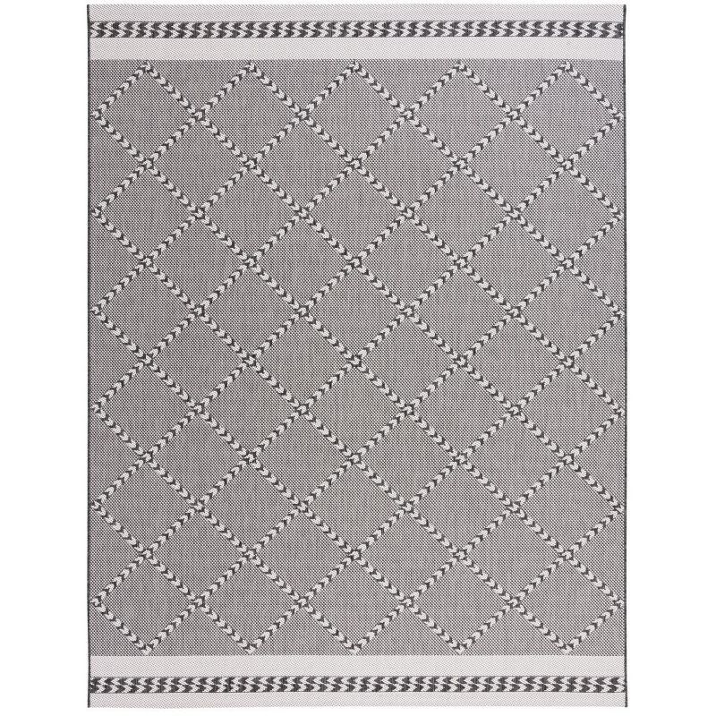 Percival Black and Ivory Geometric 8' x 10' Synthetic Area Rug