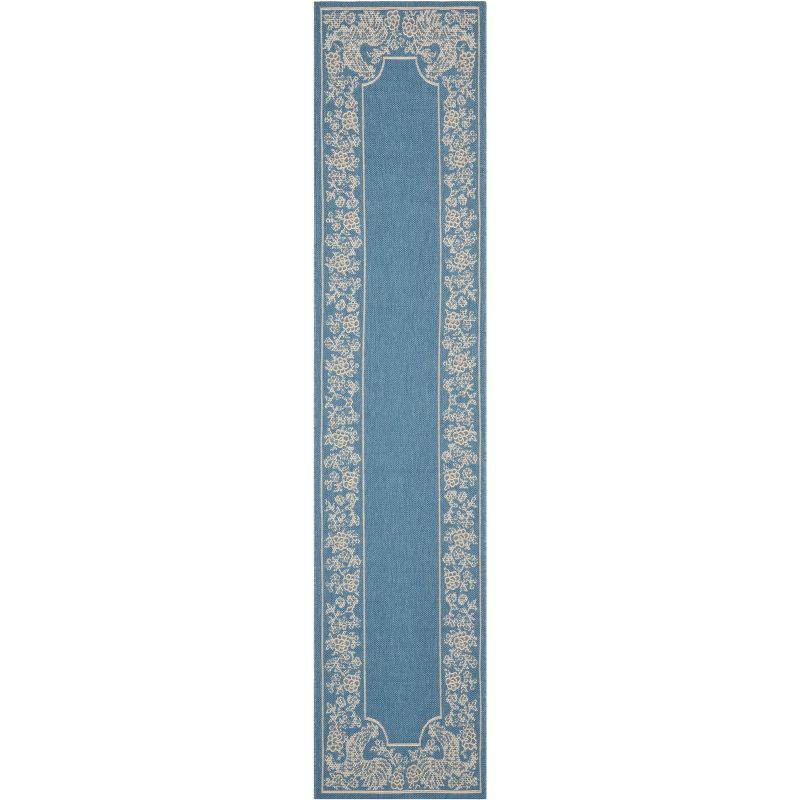 28" Blue and Natural Synthetic Reversible Flat Woven Rug