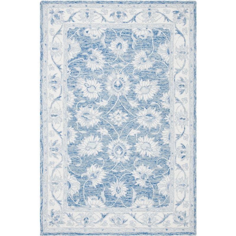 Handmade Blue and Ivory Wool 4'x6' Area Rug