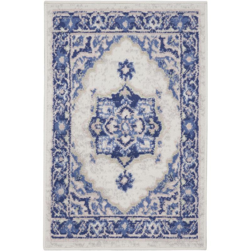 Ivory Blue Floral Synthetic 5' x 7' Reversible Area Rug